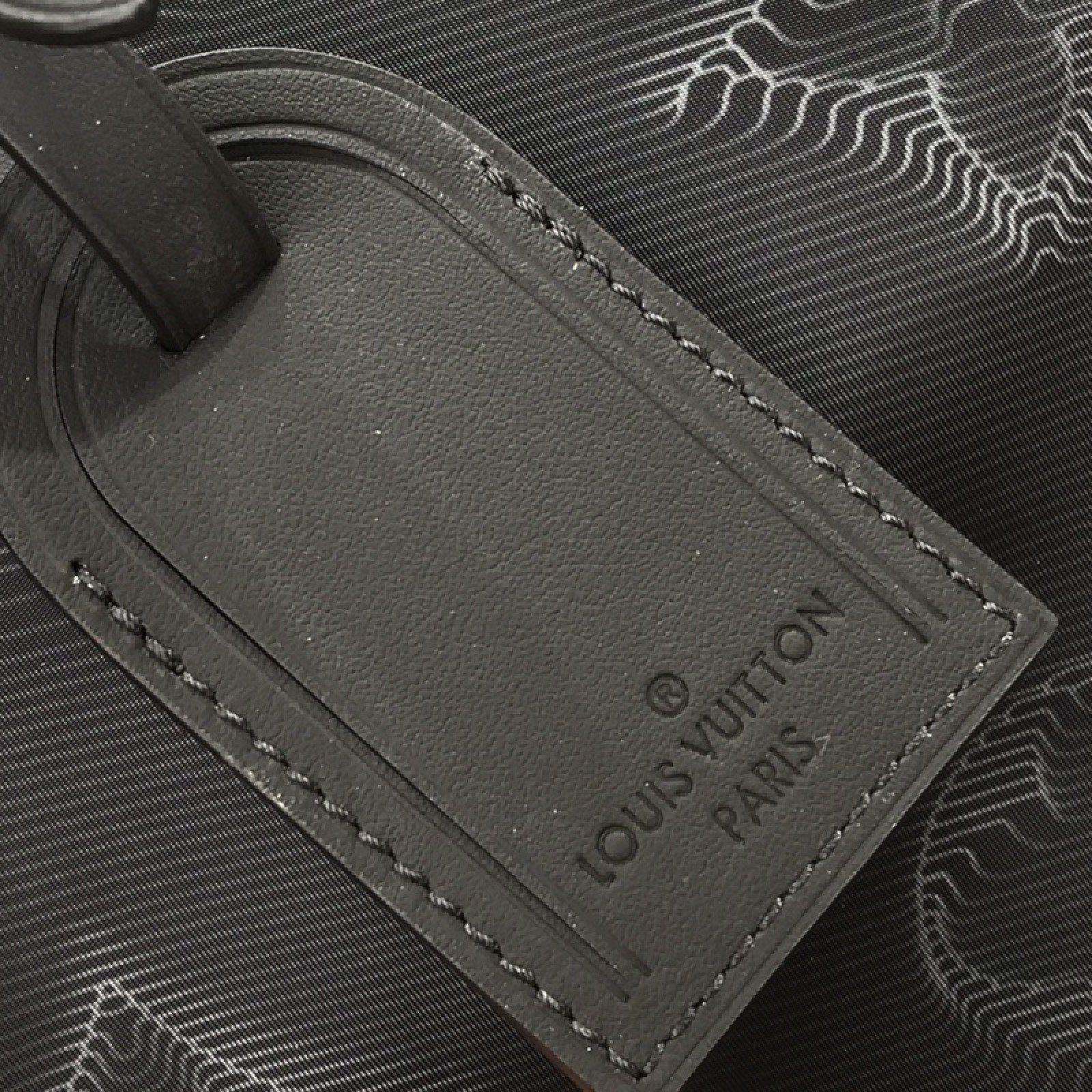 LV 2054 REVERSIBLE KEEPALL BANDOULIERE 50 M45602