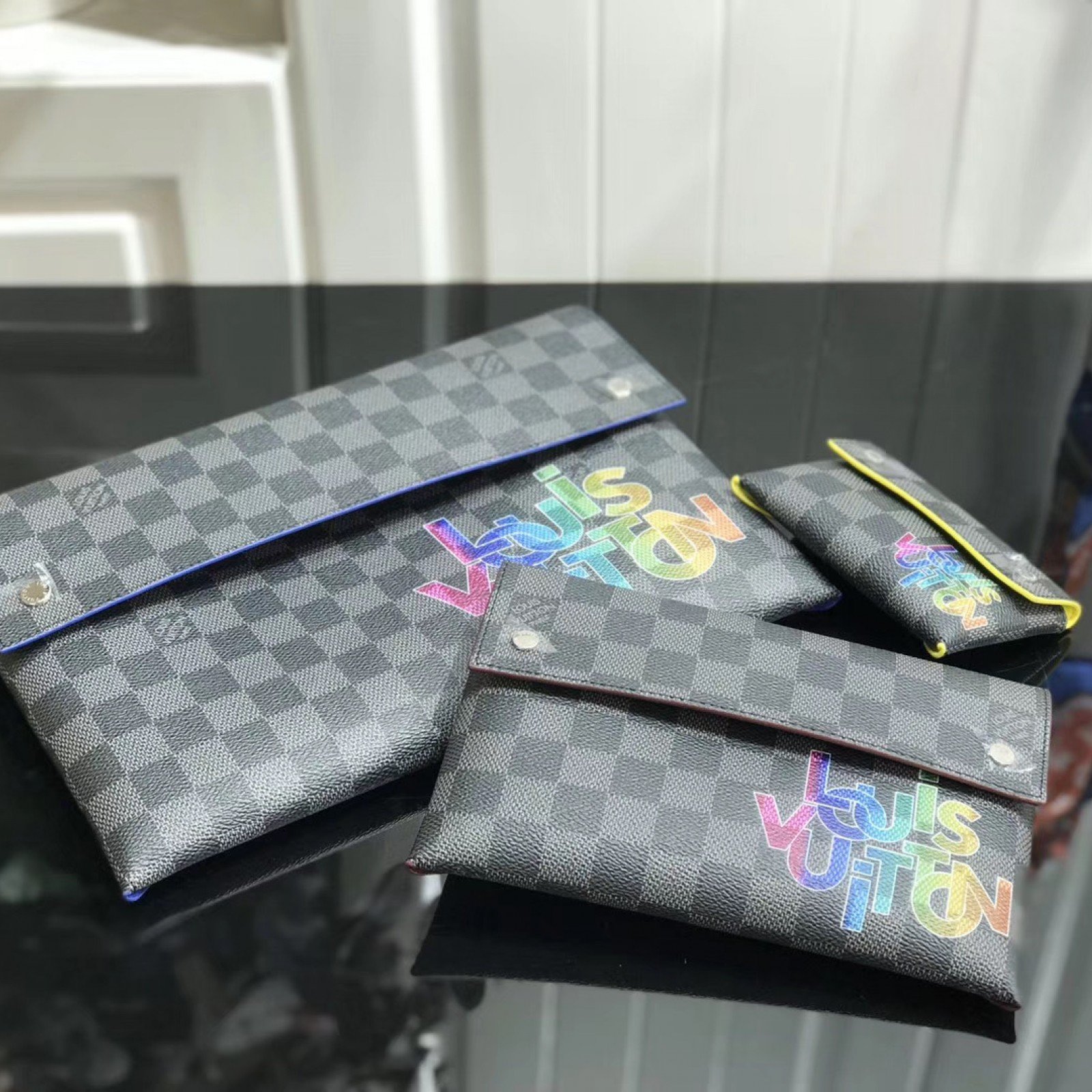 LV ALPHA TRIPLE POUCHES N60255LC
