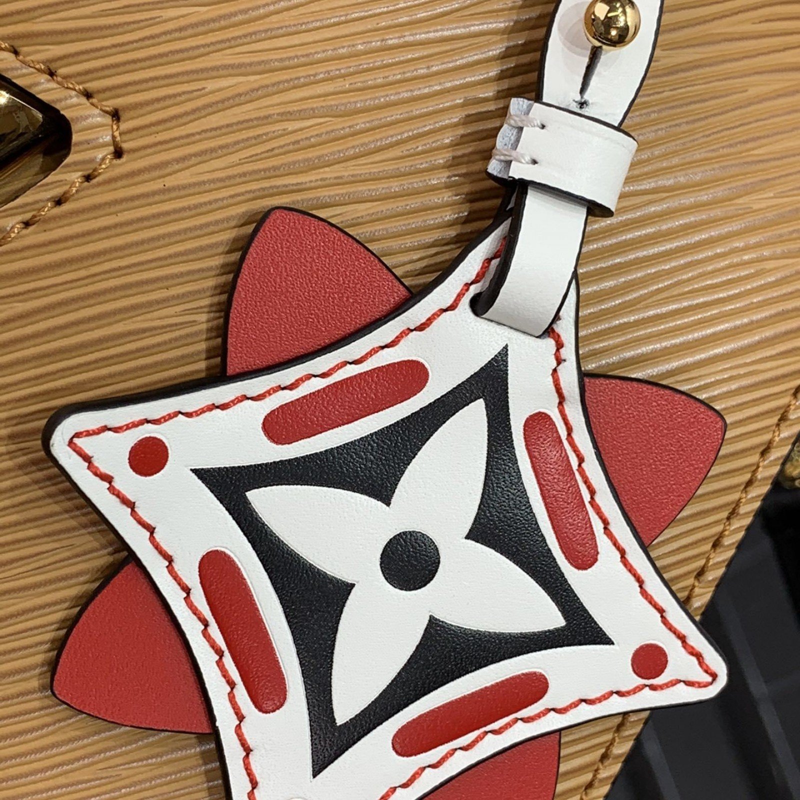 LV CRAFTY TWIST MM M56780