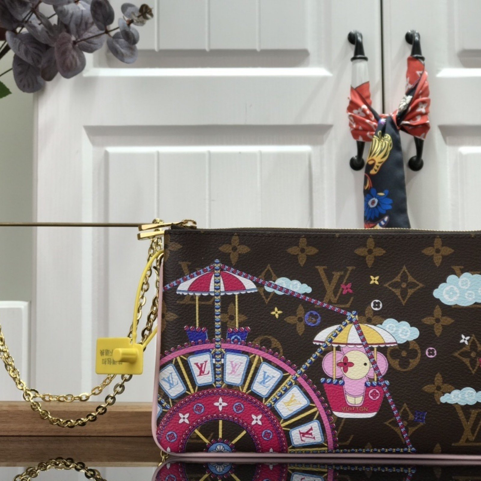 LV DOUBLE ZIP POCHETTE M69744