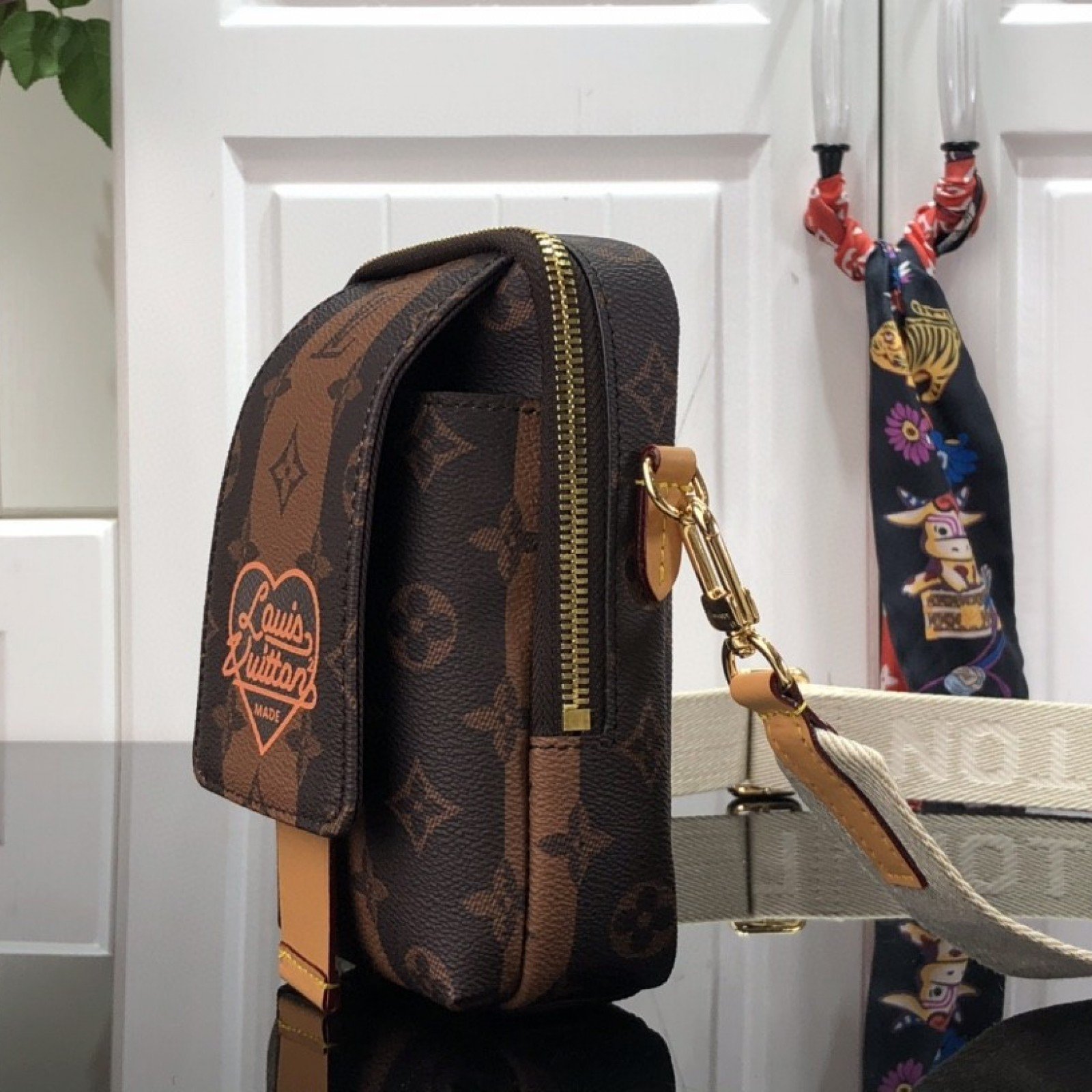LV FLAP DOUBLE PHONE POUCH M81005