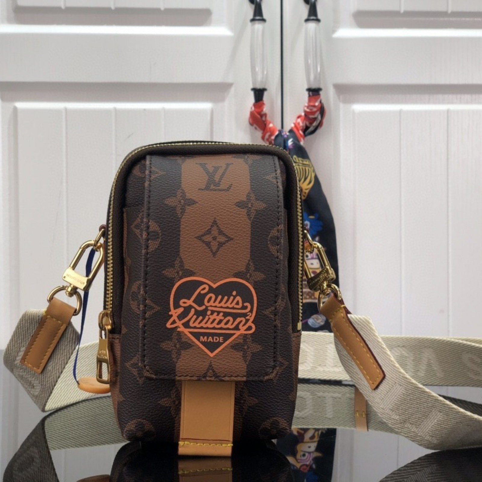 LV FLAP DOUBLE PHONE POUCH M81005