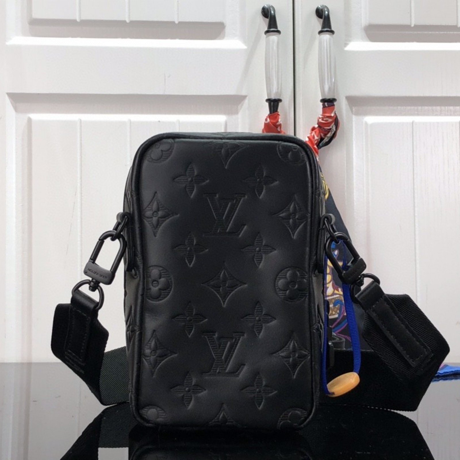 LV FLAP DOUBLE PHONE POUCH M81005G