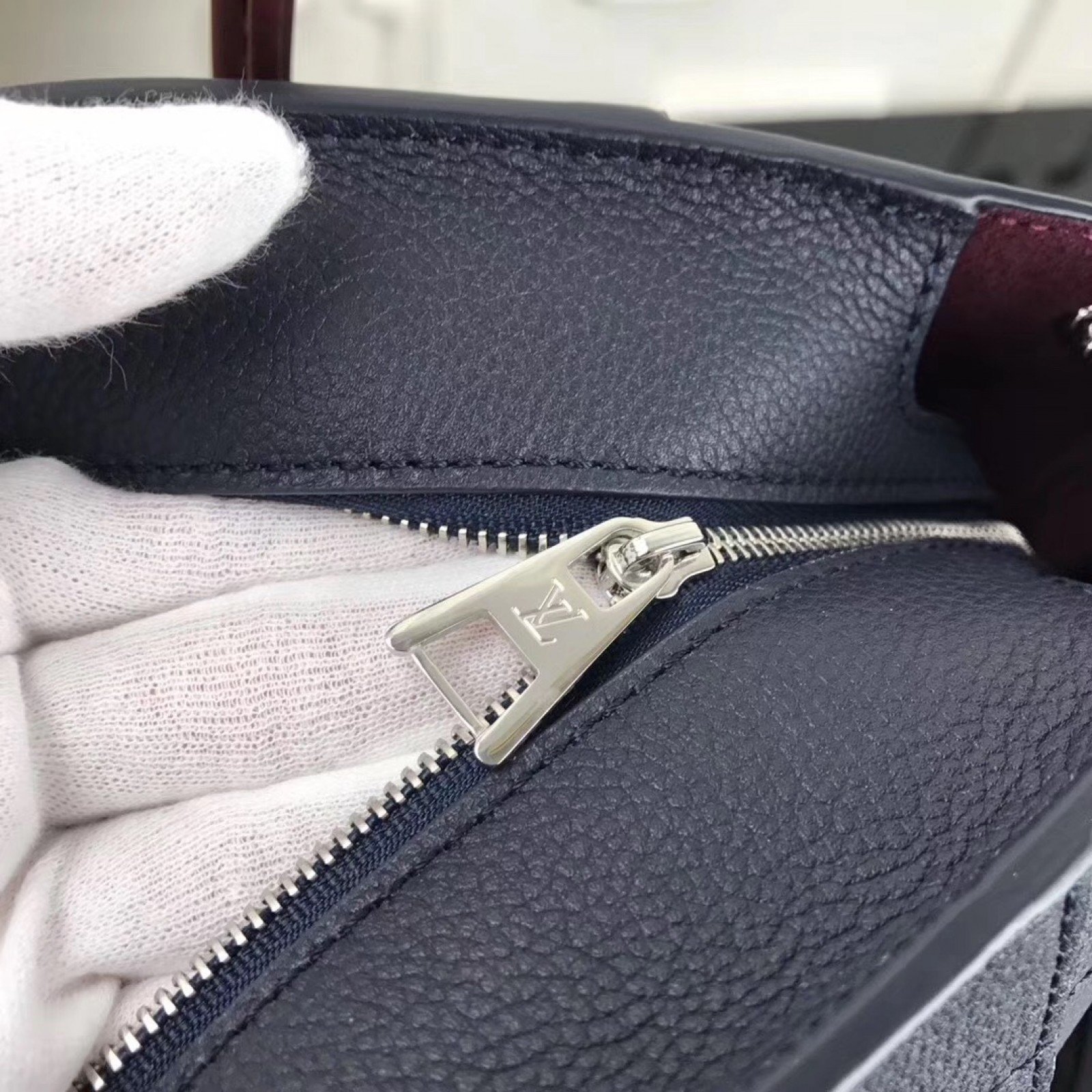 LV FREEDOM Handbag M54843