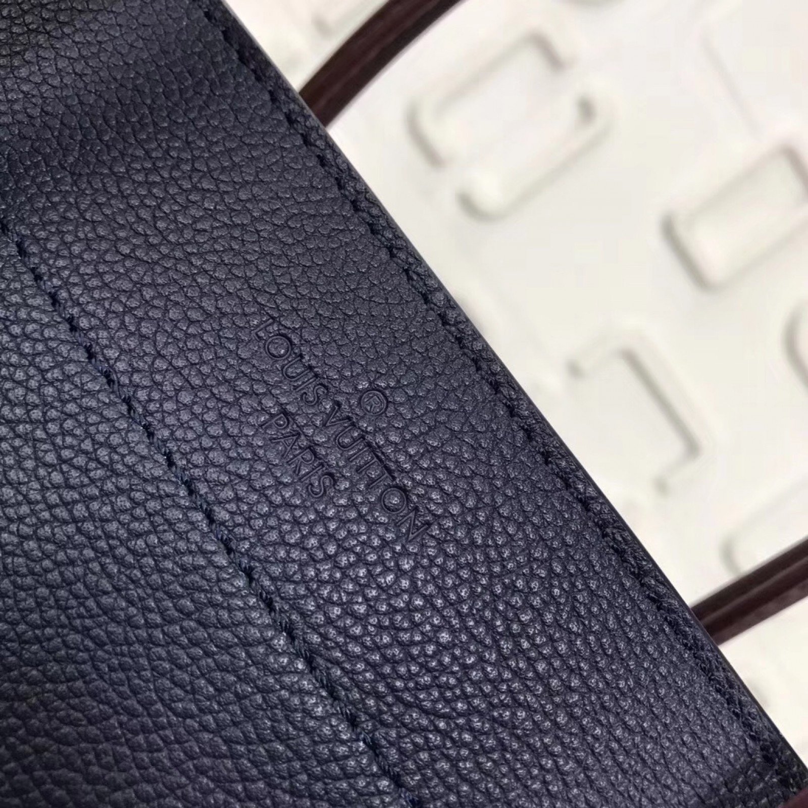 LV FREEDOM Handbag M54843