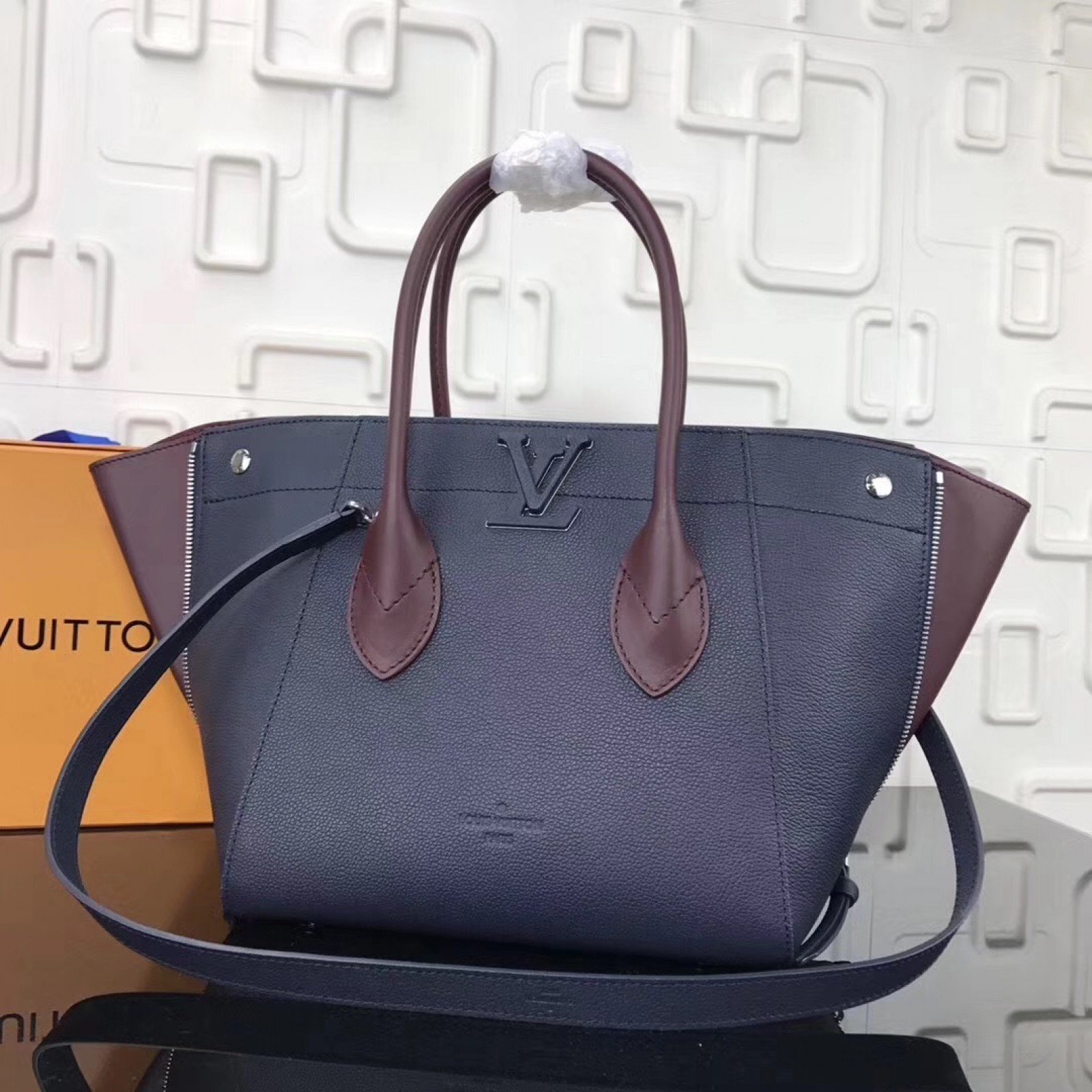 LV FREEDOM Handbag M54843