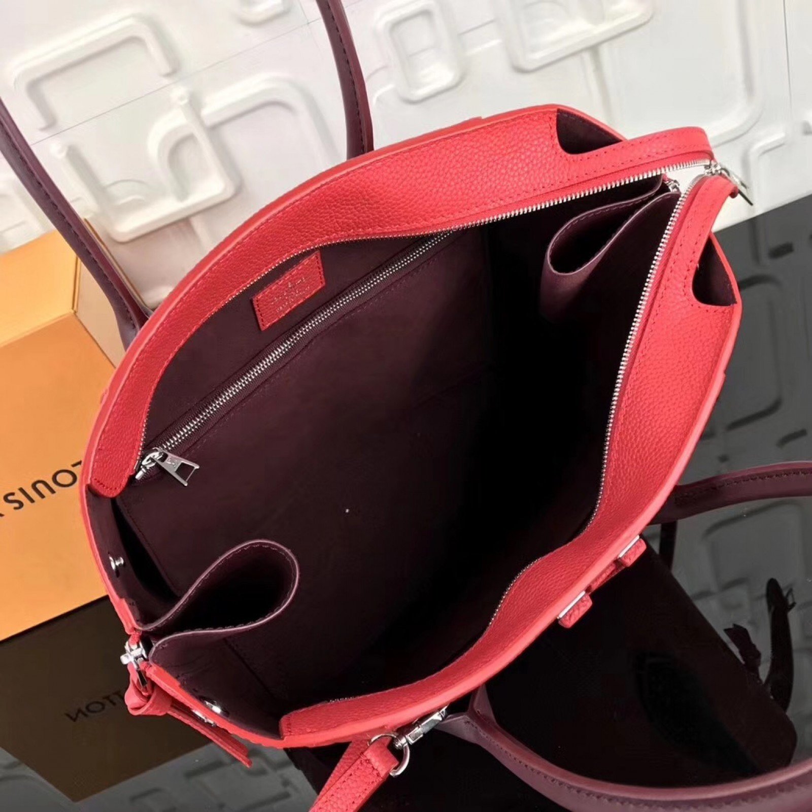 LV FREEDOM Handbag M54843