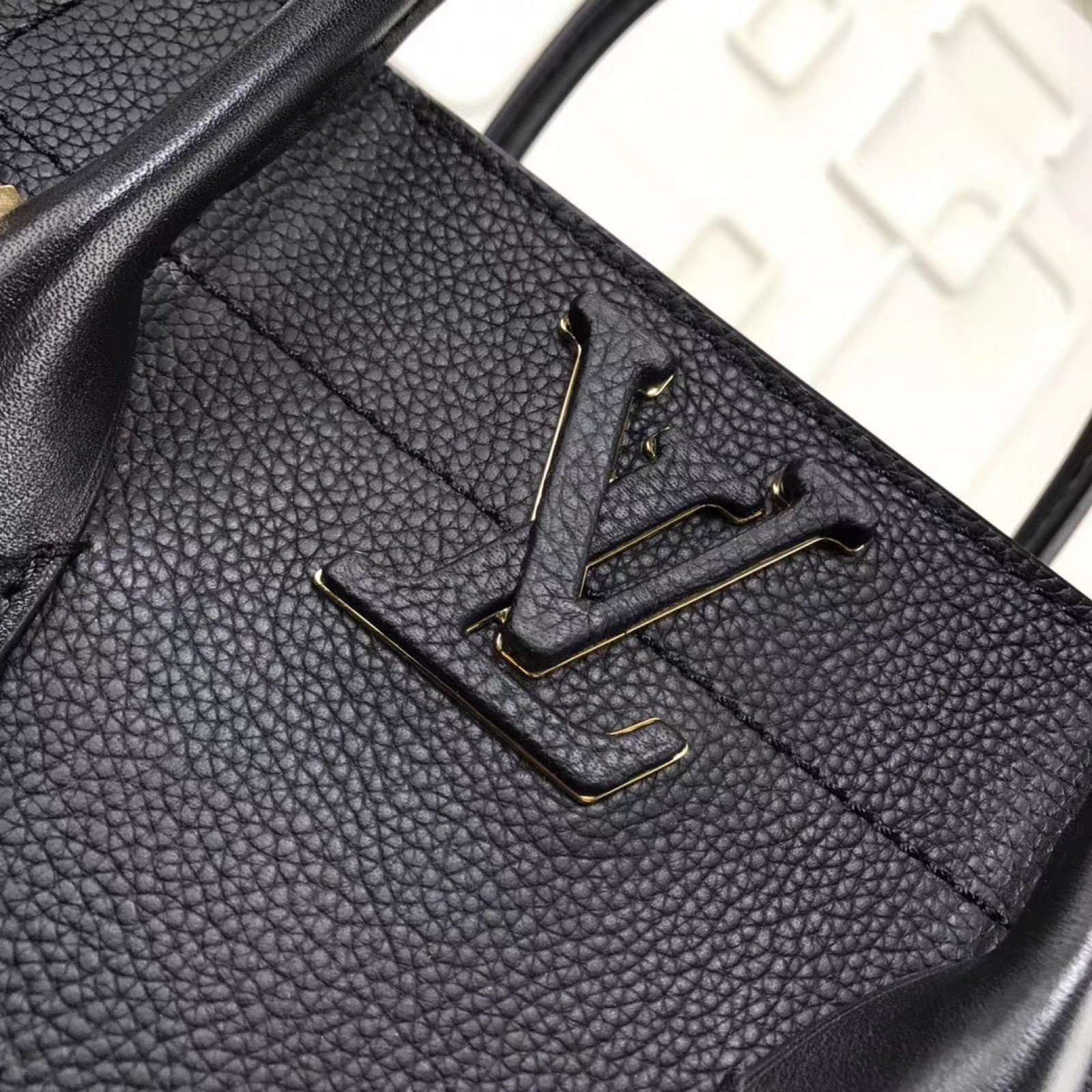LV FREEDOM Handbag M54843