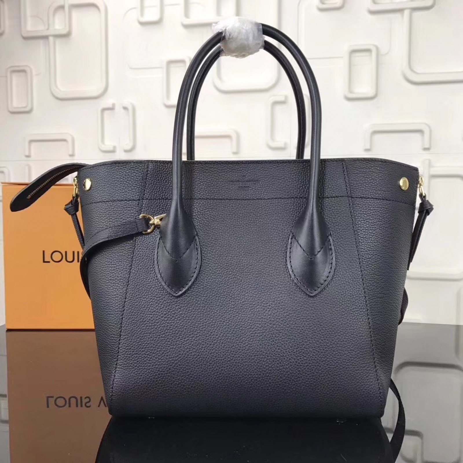LV FREEDOM Handbag M54843