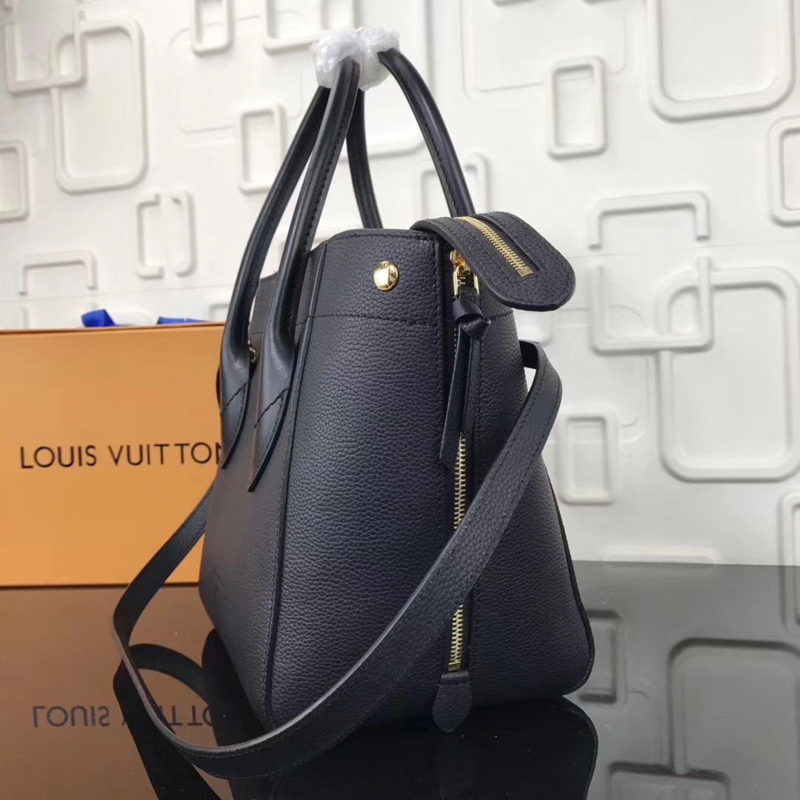 LV FREEDOM Handbag M54843