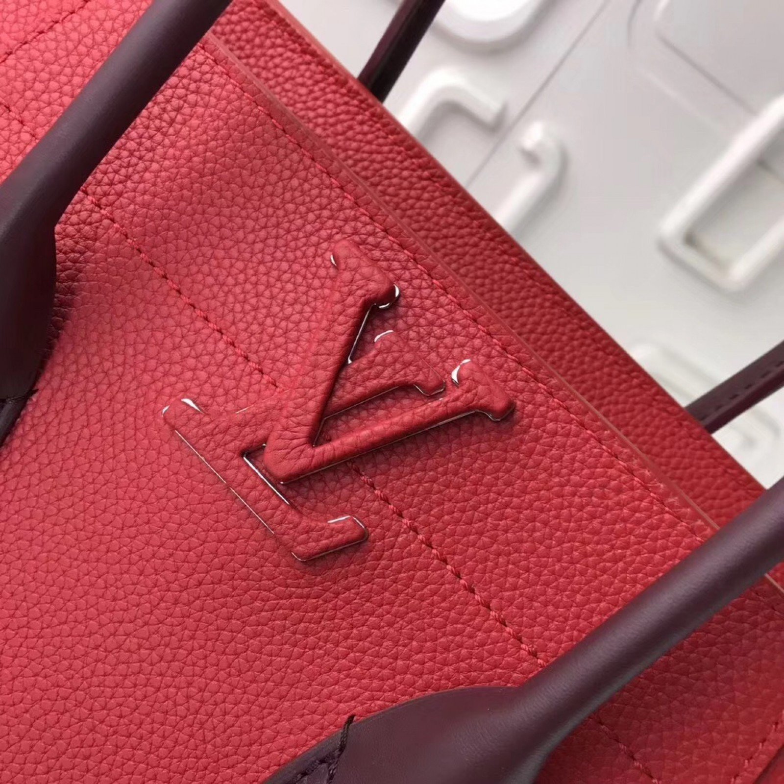 LV FREEDOM Handbag M54843