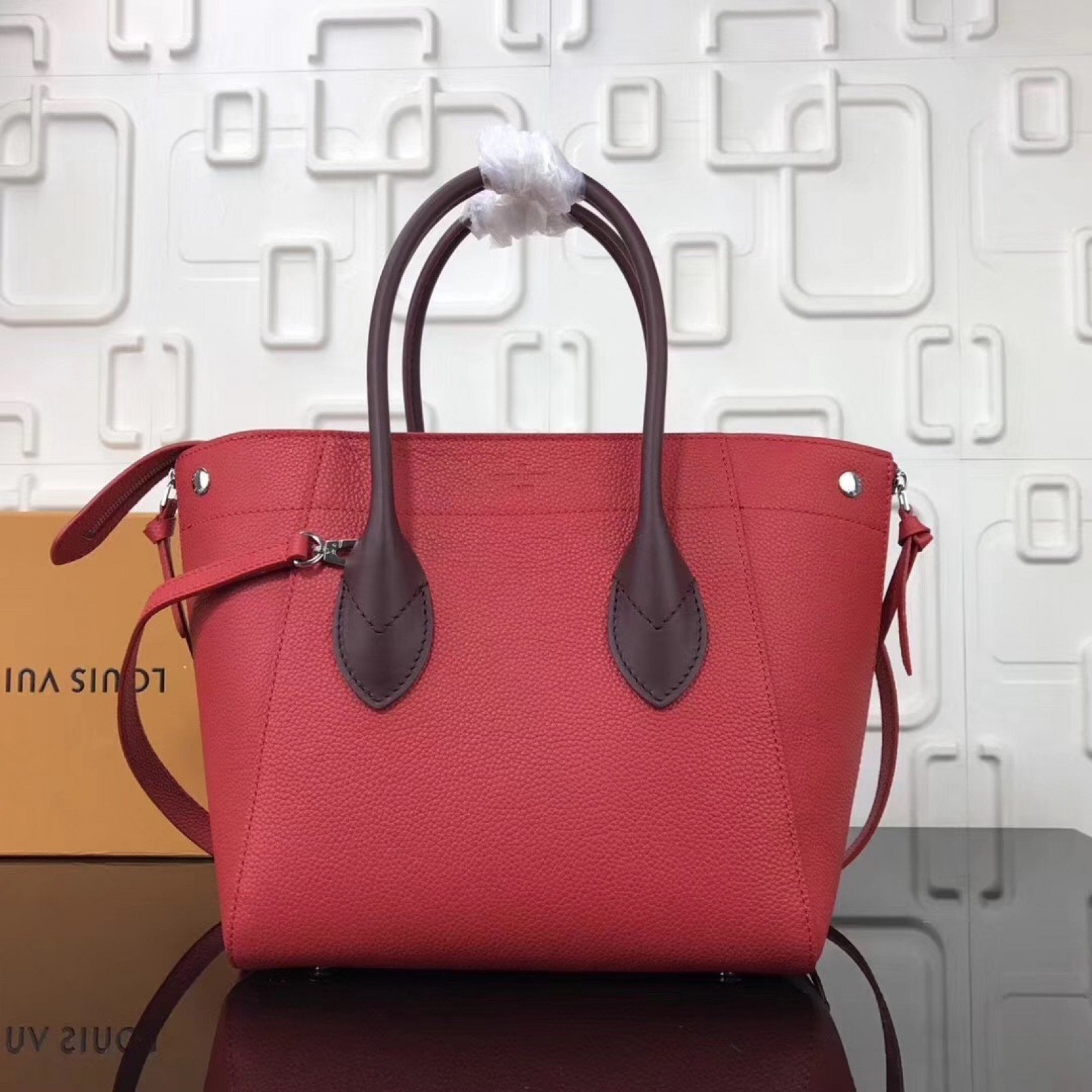 LV FREEDOM Handbag M54843