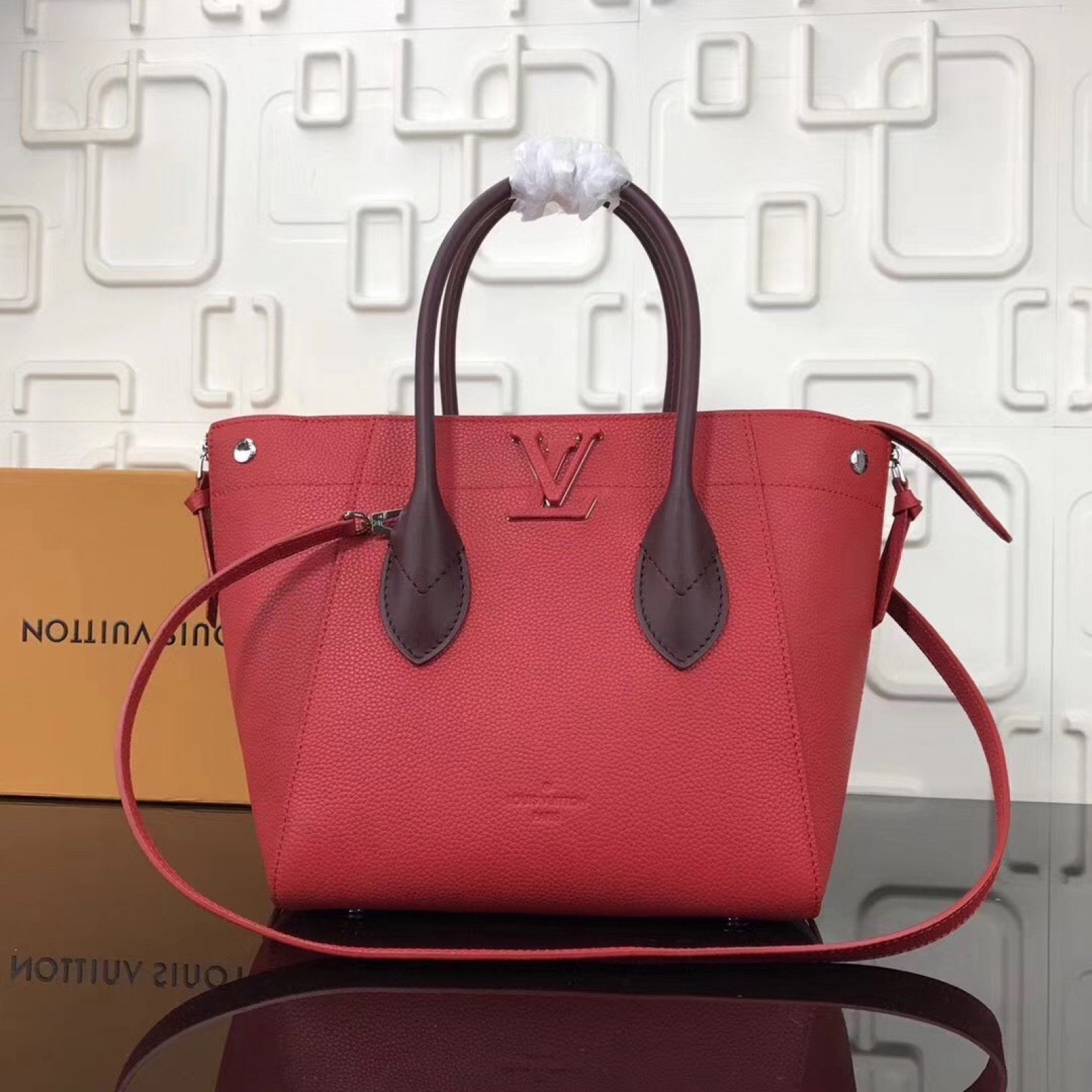 LV FREEDOM Handbag M54843