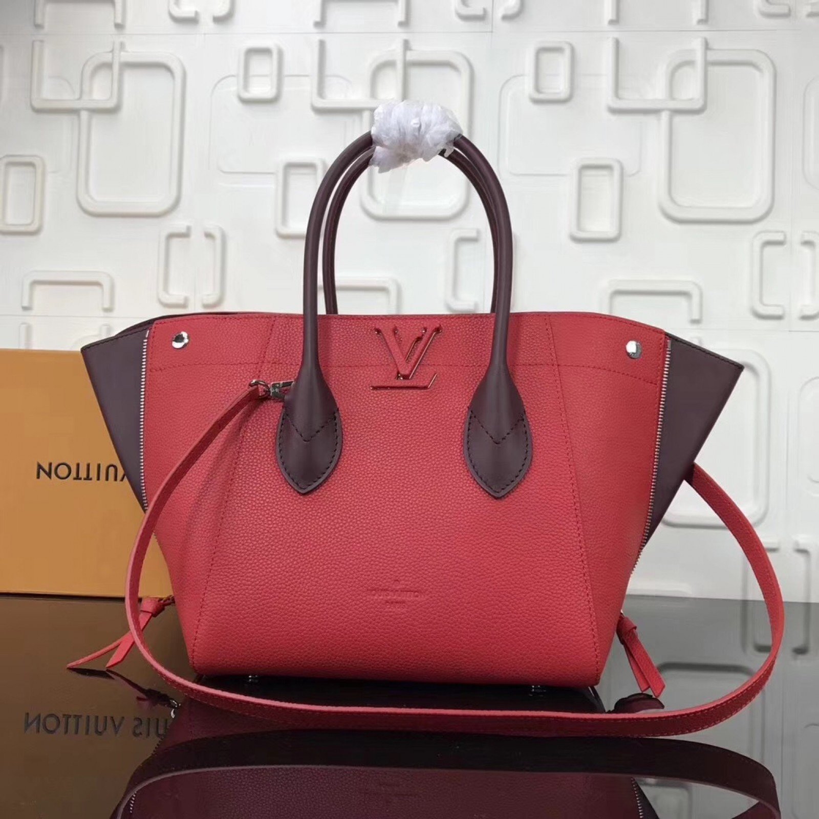 LV FREEDOM Handbag M54843