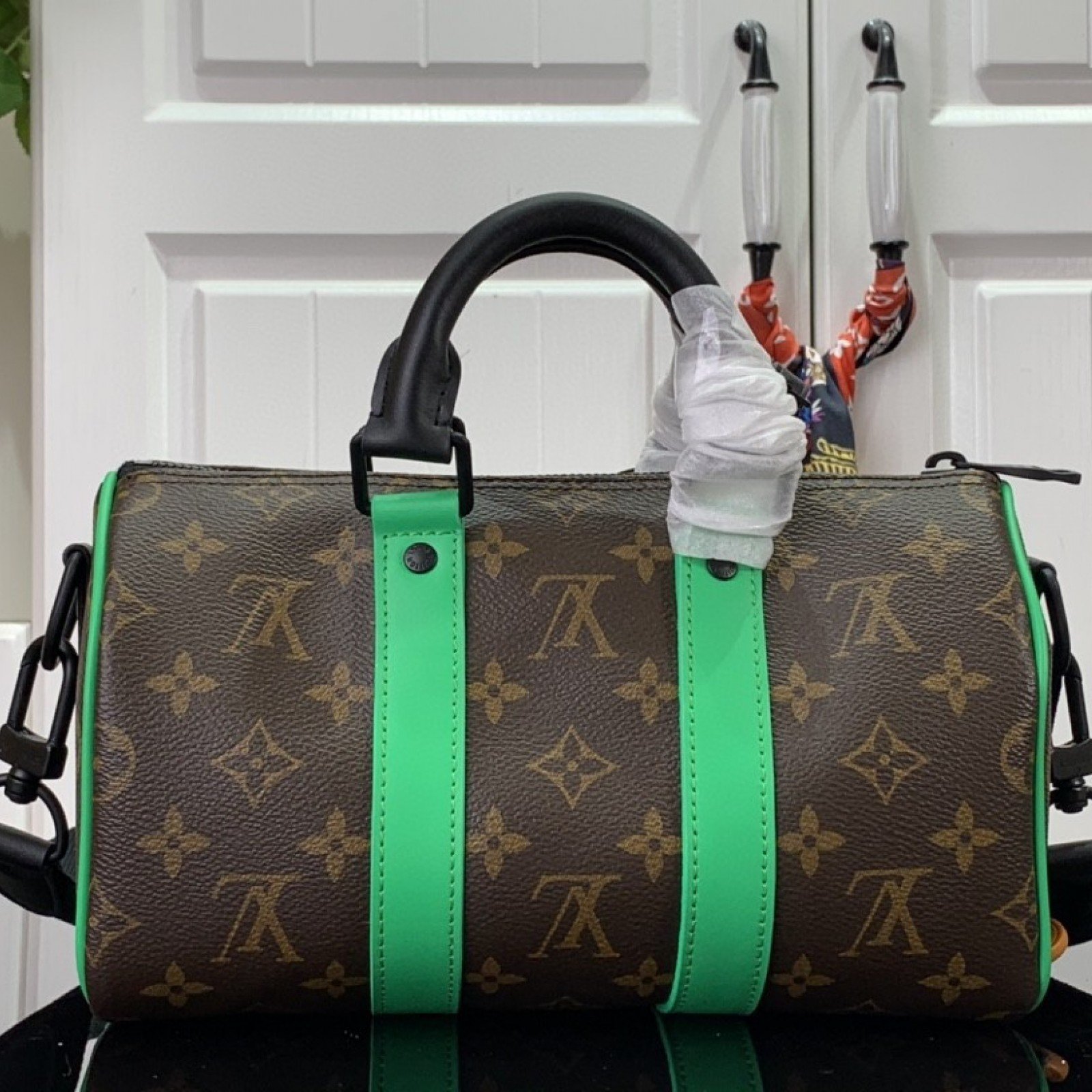 LV KEEPALL BANDOULIERE 25 M46249