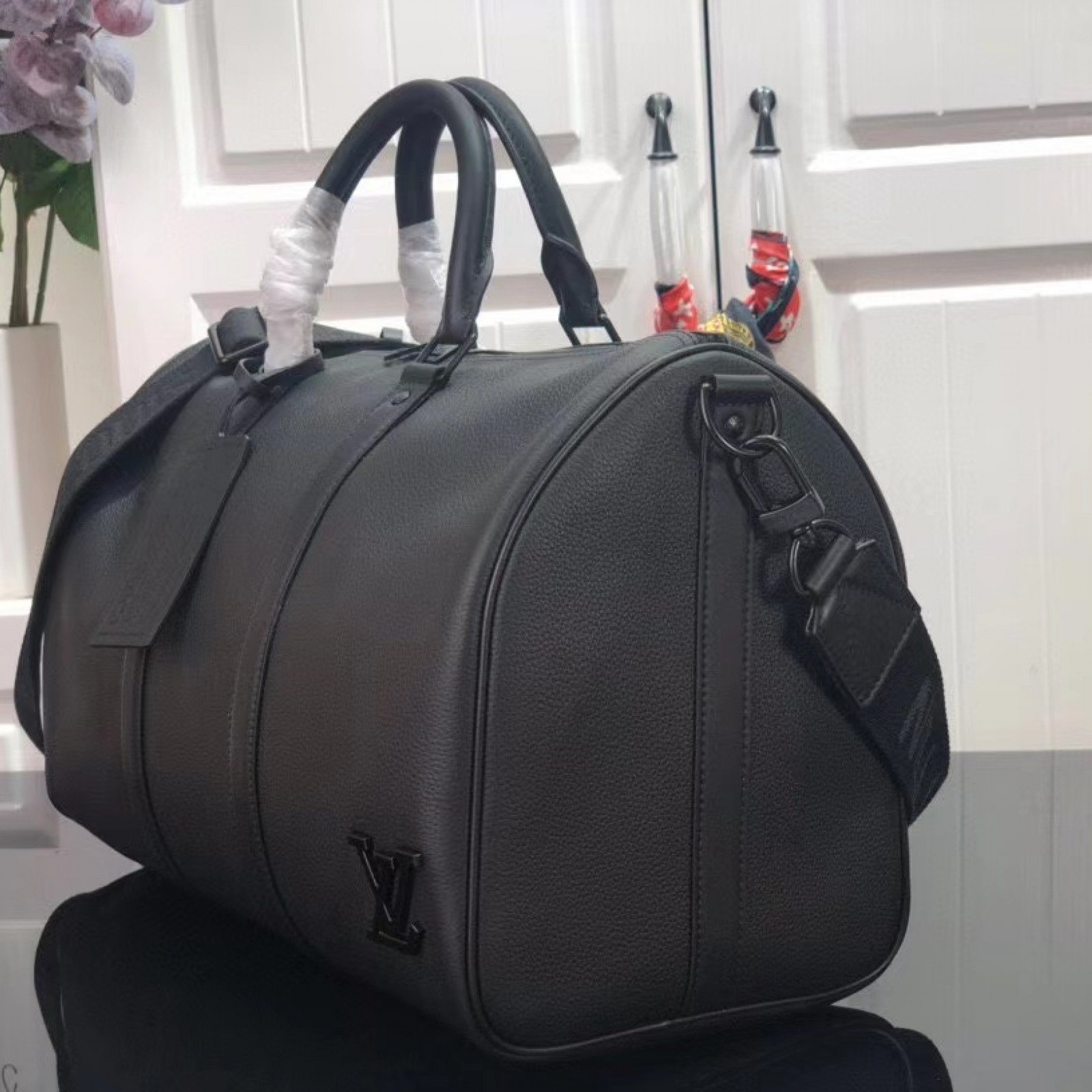 LV KEEPALL BANDOULIERE 40 M57088