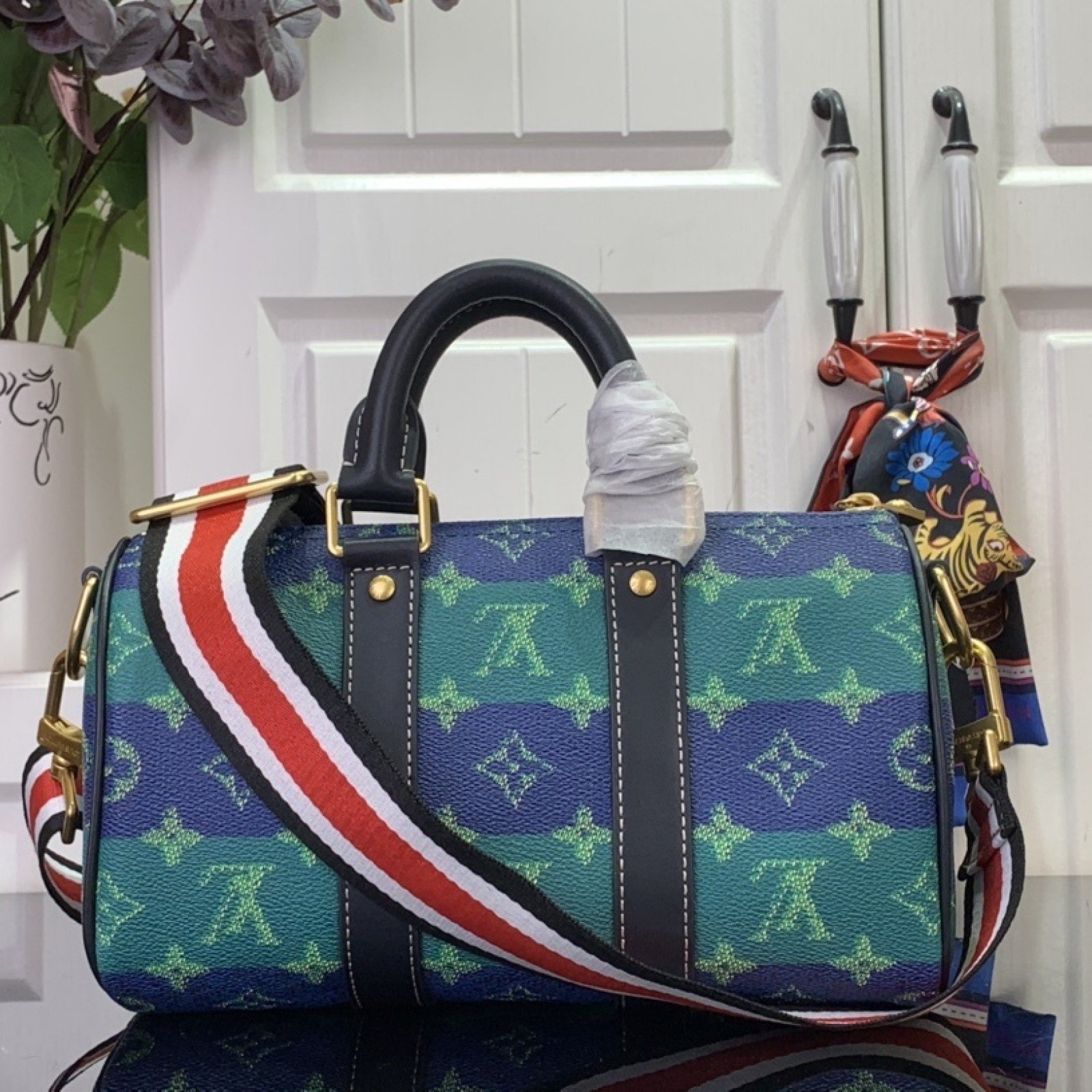 LV KEEPALL BANDOULIÈRE 25  M25786