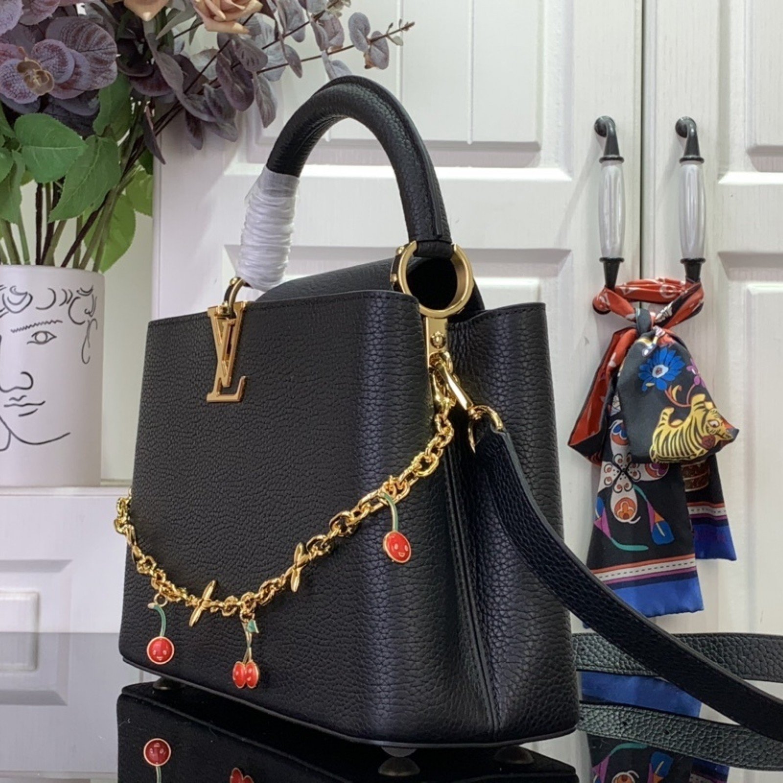 LV LV x TM CAPUCINES bb   m13714