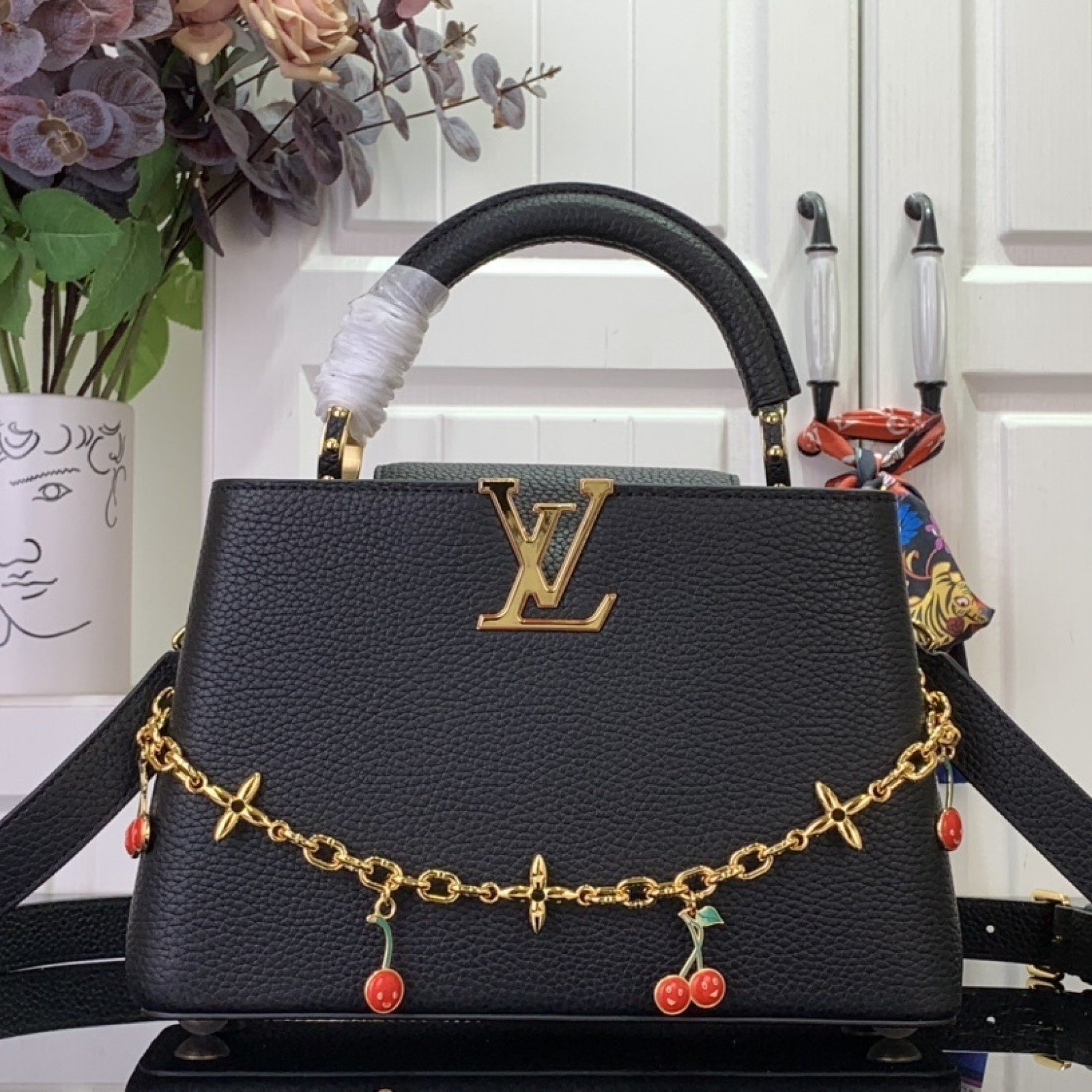 LV LV x TM CAPUCINES bb   m13714