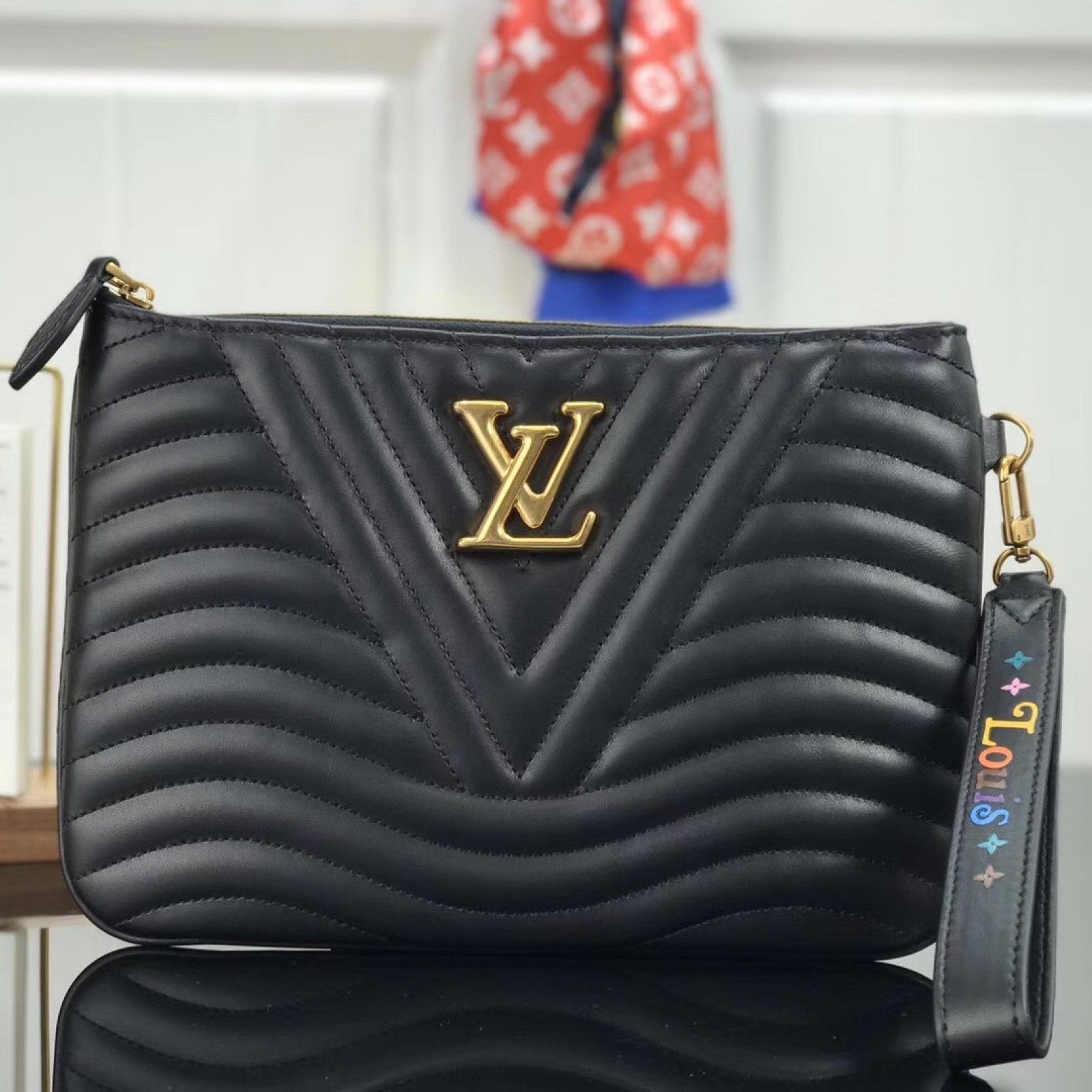 LV NEW WAVE ZIP POCHETTE M63943