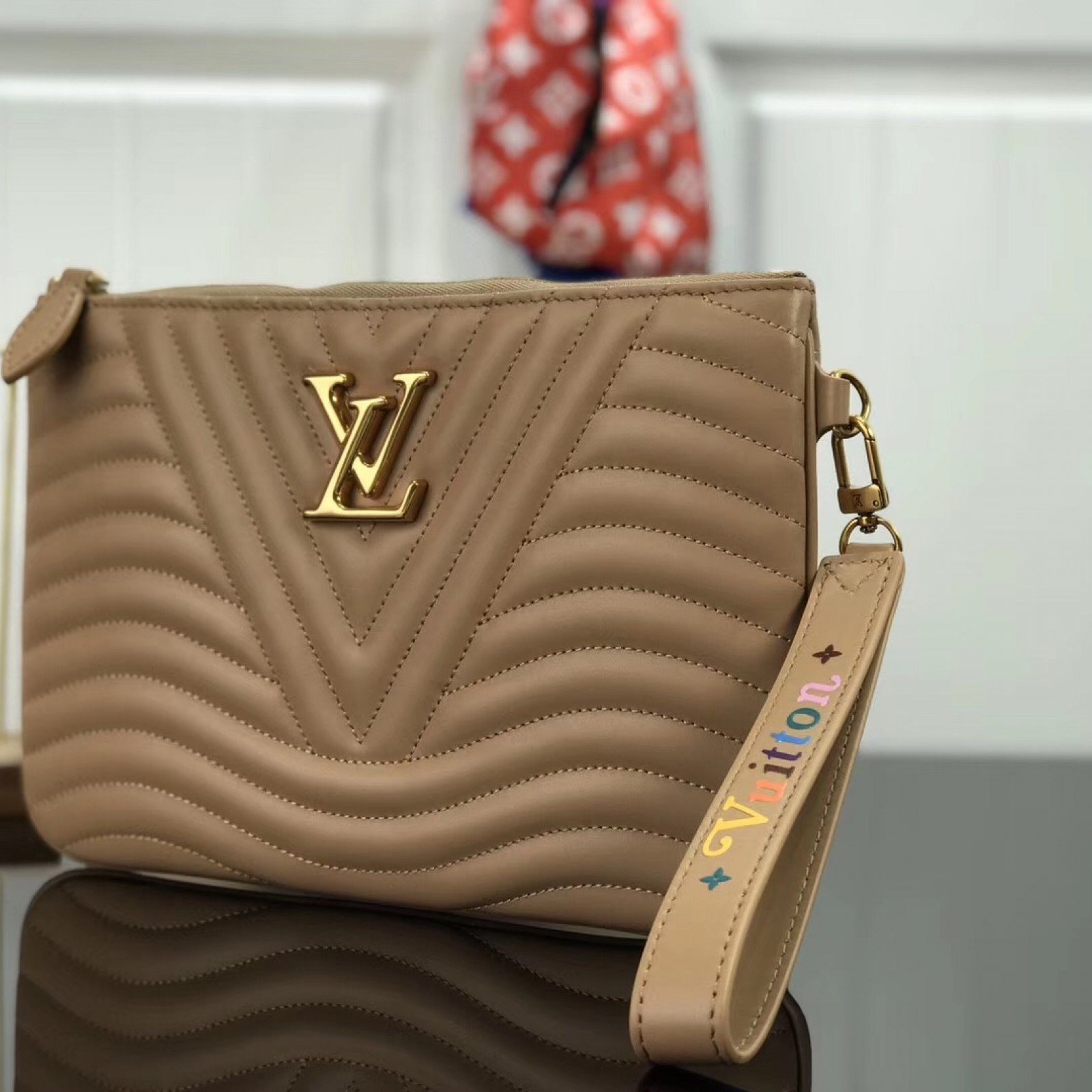 LV NEW WAVE ZIP POCHETTE M63943