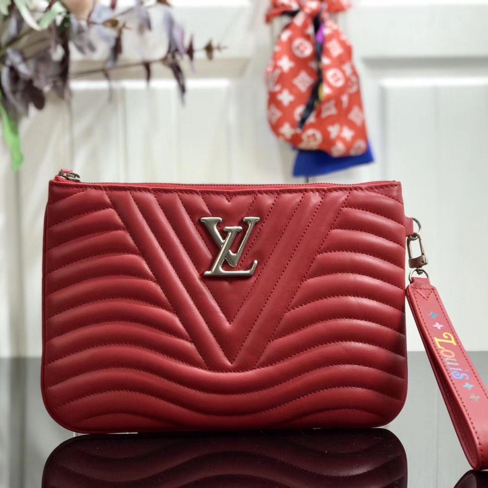 LV NEW WAVE ZIP POCHETTE M63943