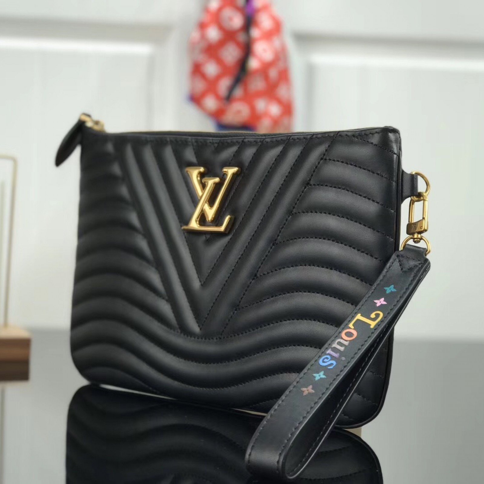 LV NEW WAVE ZIP POCHETTE M63943