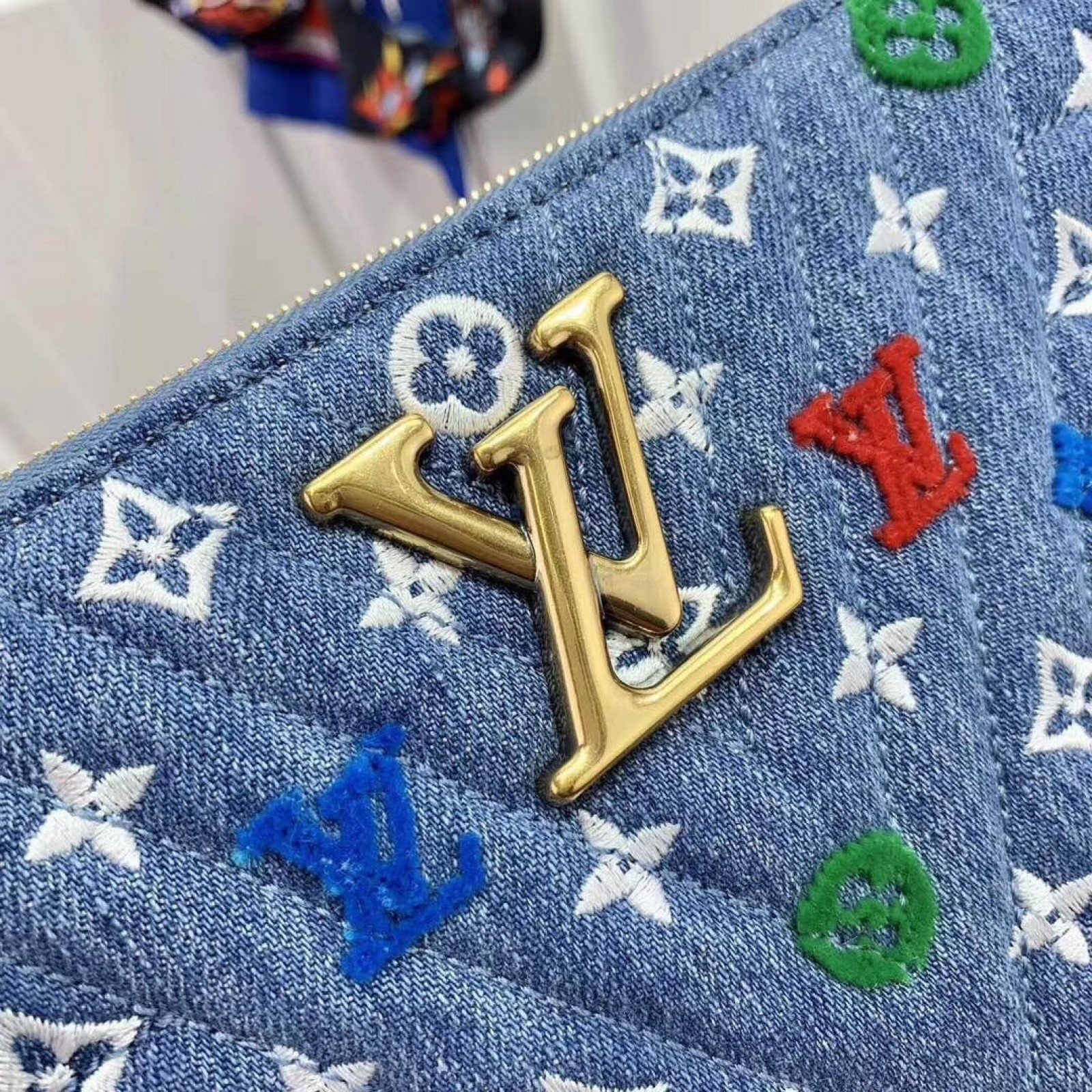 LV NEW WAVE ZIP POCHETTE M67538