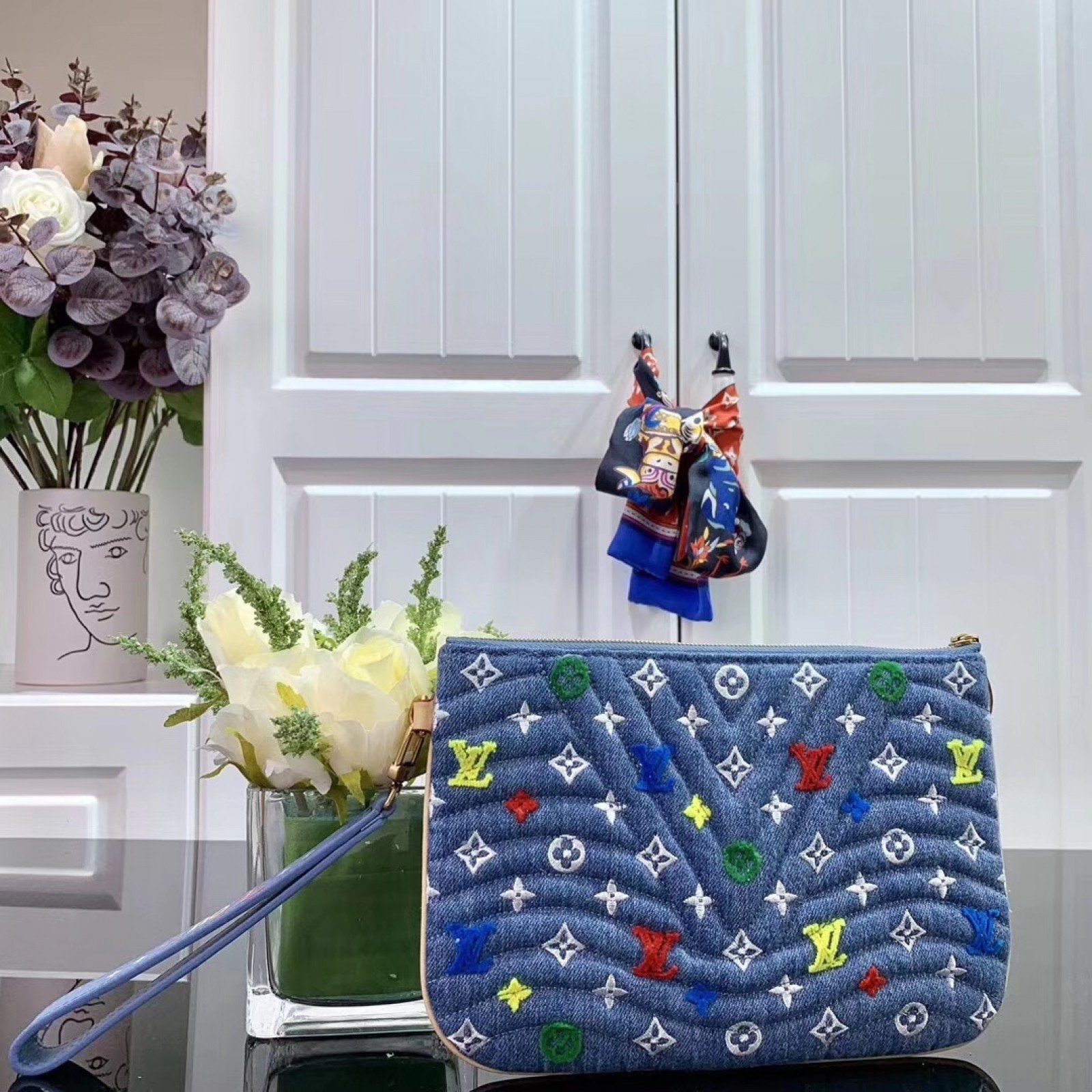 LV NEW WAVE ZIP POCHETTE M67538