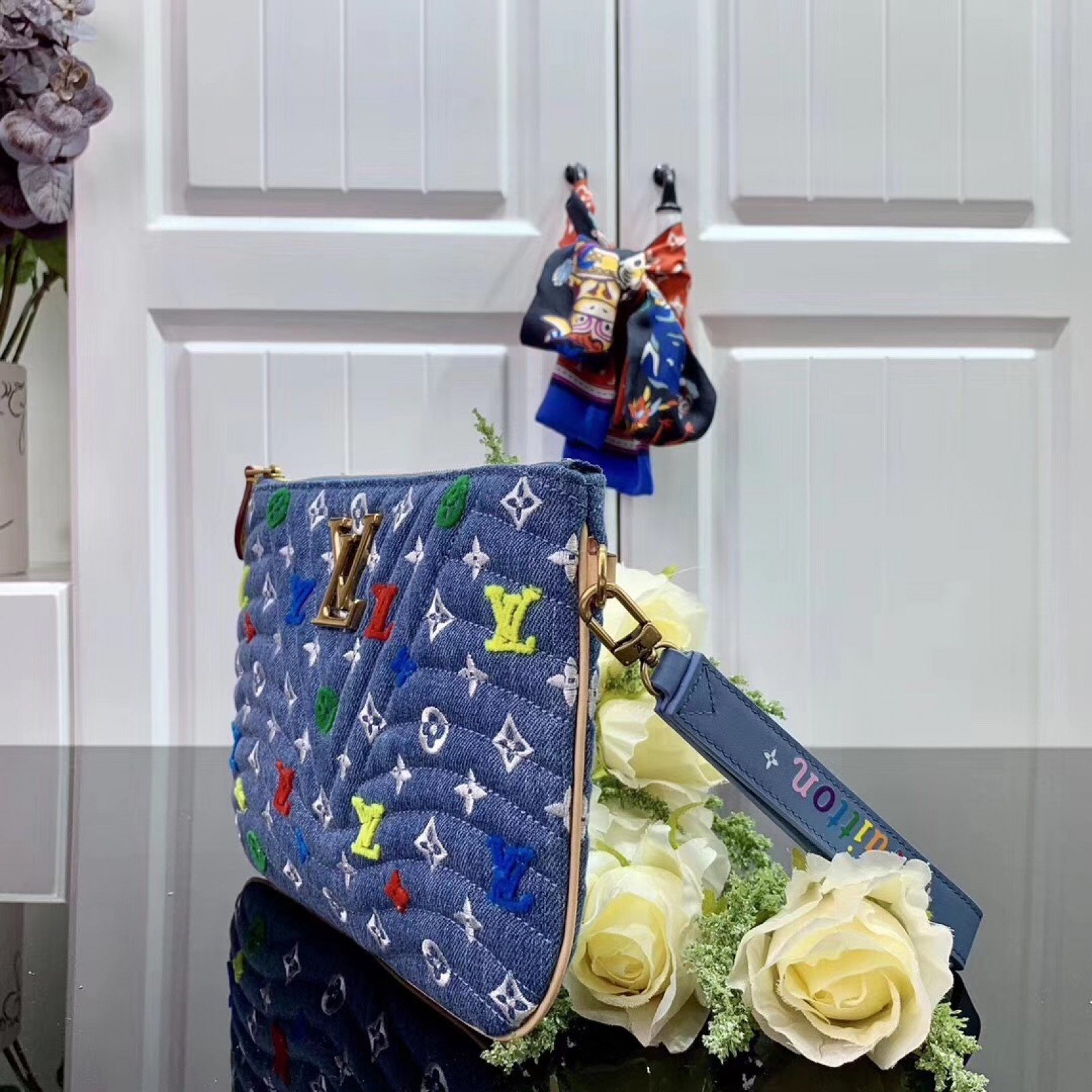 LV NEW WAVE ZIP POCHETTE M67538