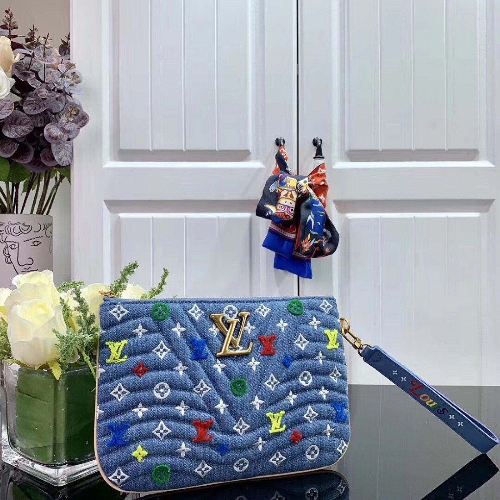 LV NEW WAVE ZIP POCHETTE M67538