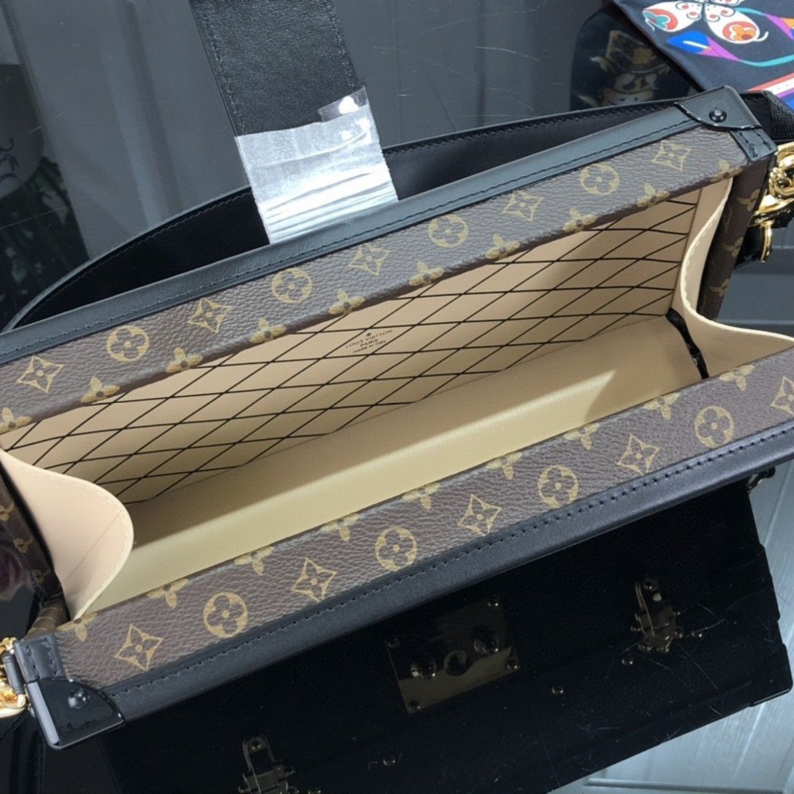 LV PETITE MALLE EAST WEST M46120