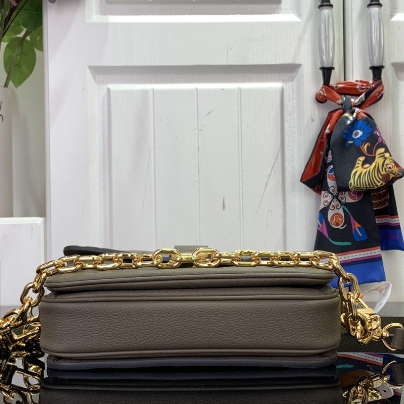 LV Pochette Metis East West m25910