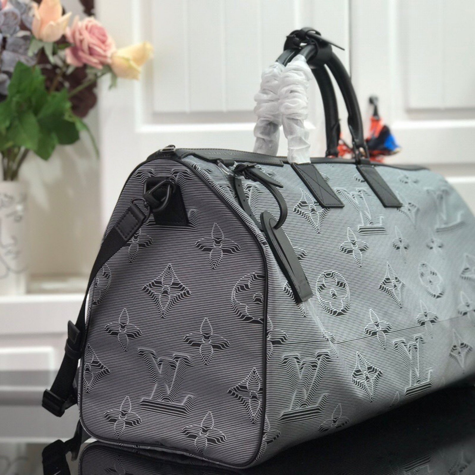 LV REVERSIBLE KEEPALL BANDOULIERE 50 M44939