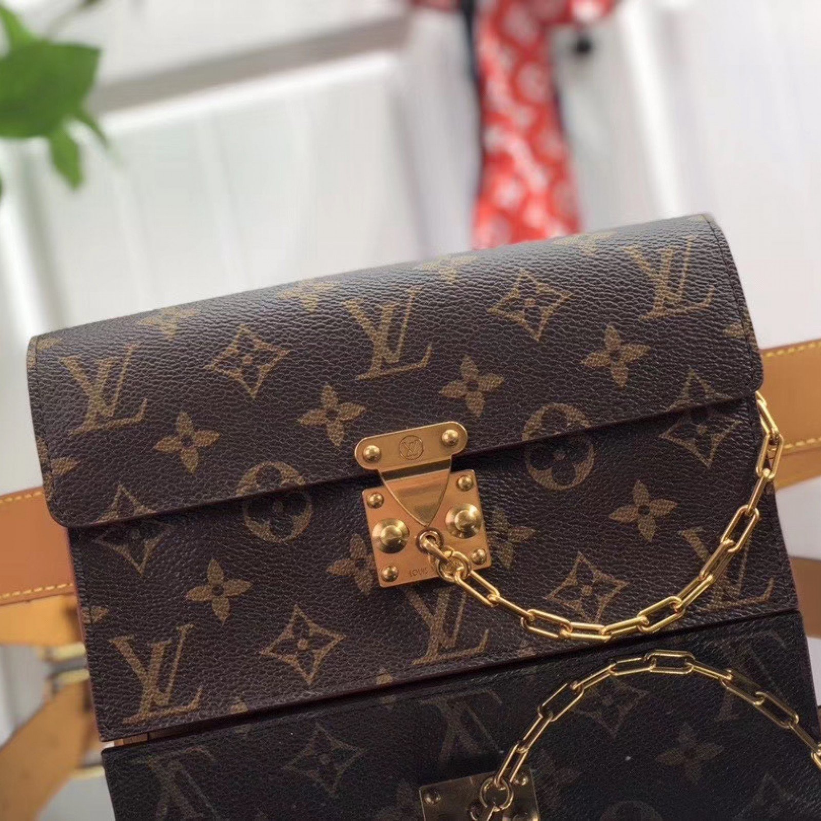 LV S LOCK BELT POUCH PM M44667