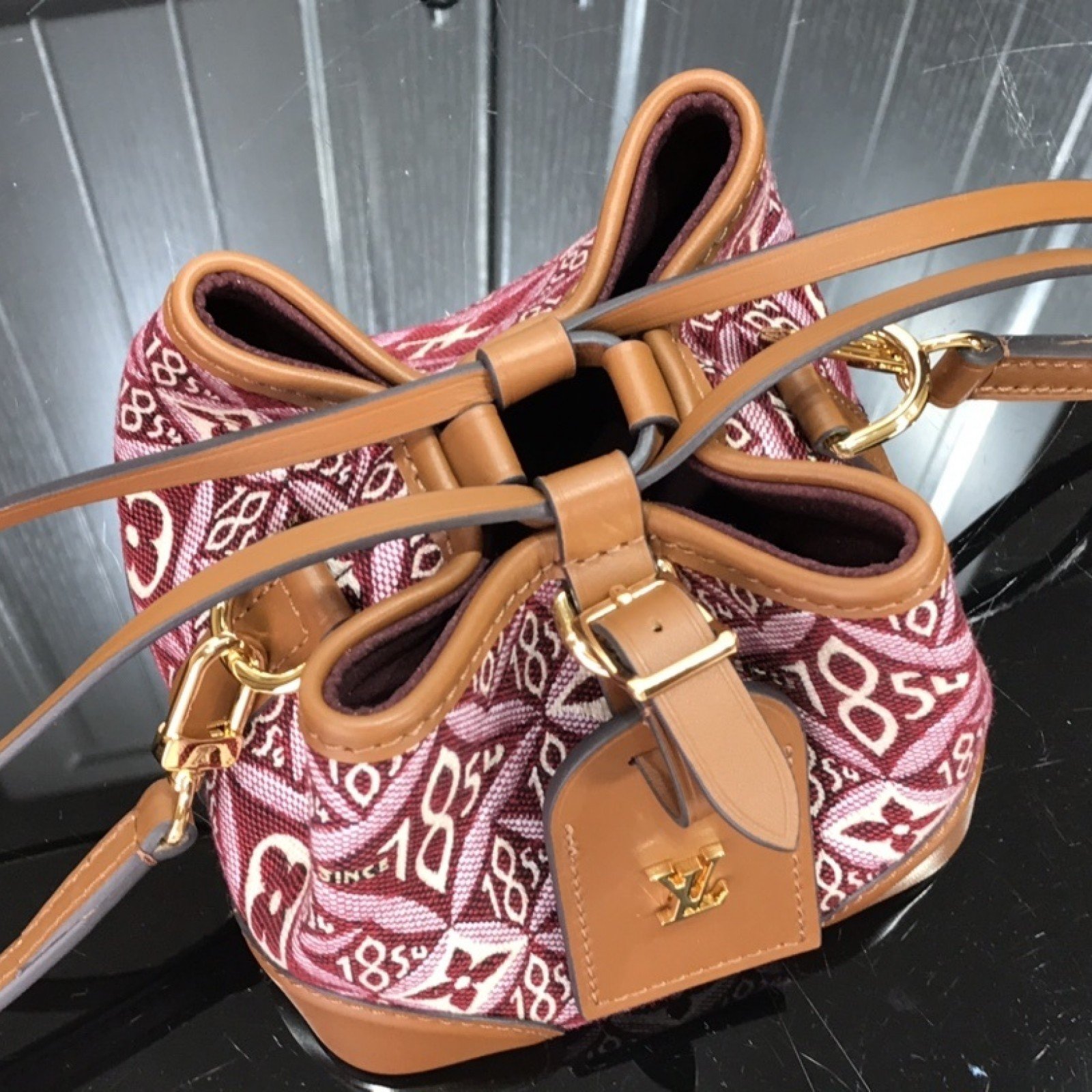 LV SINCE 1854 NOE PURSE M69973