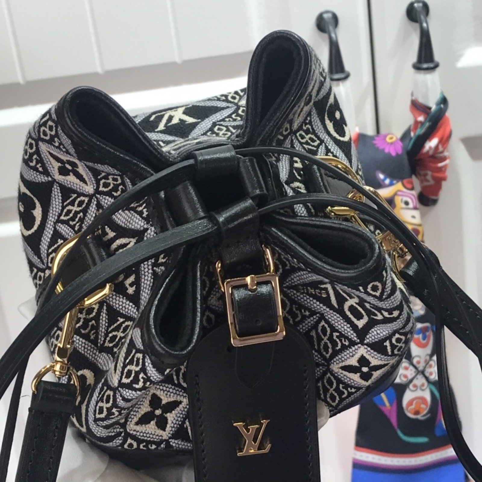 LV SINCE 1854 NOE PURSE M69973