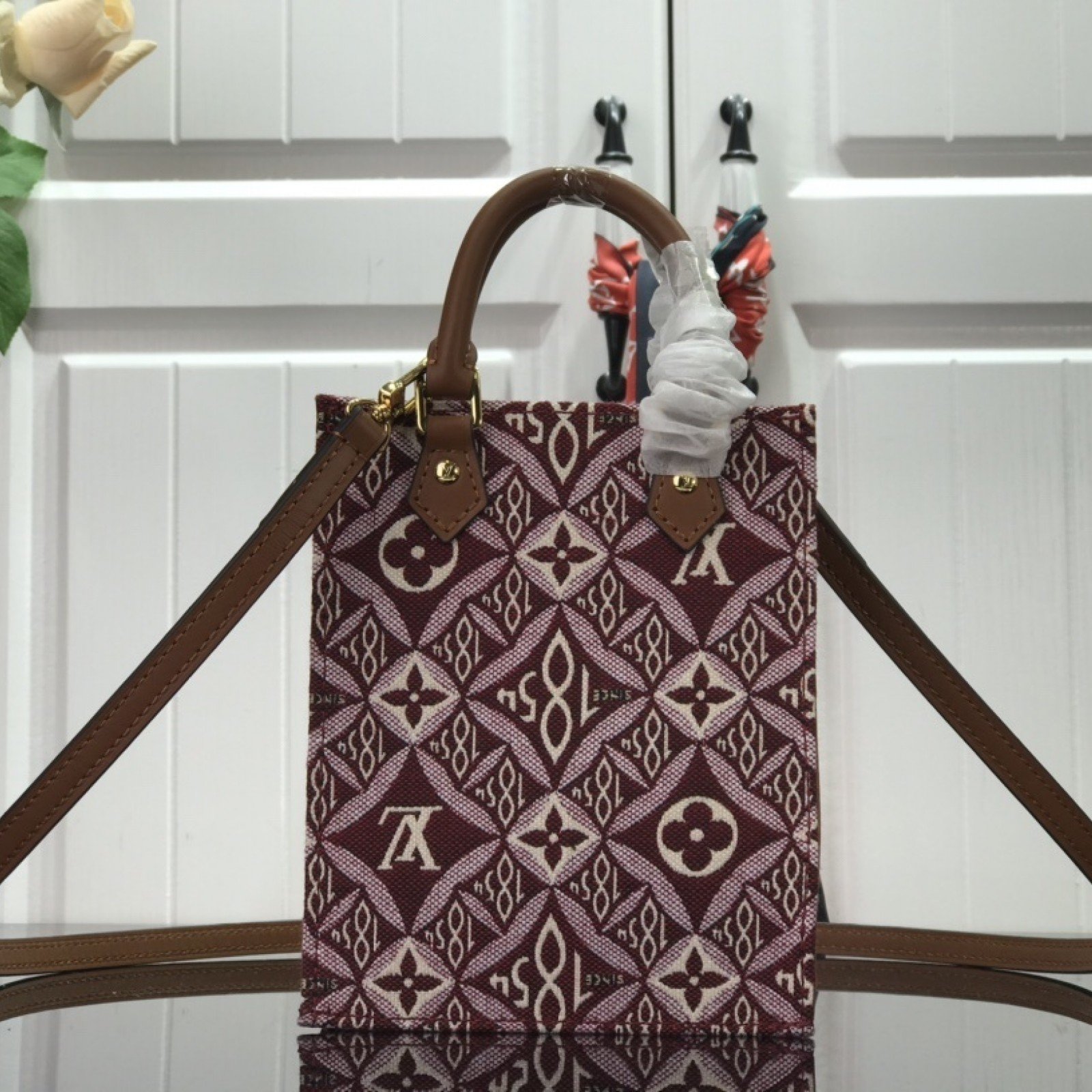 LV SINCE 1854 PETIT SAC PLAT M80288