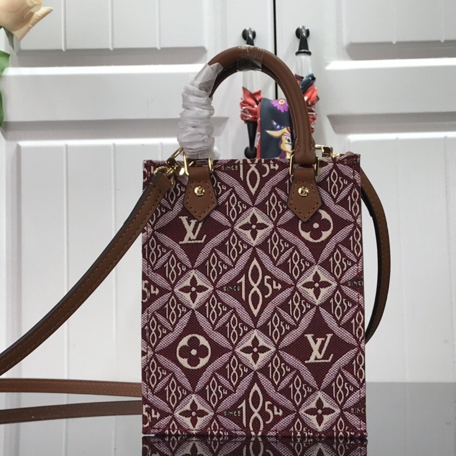 LV SINCE 1854 PETIT SAC PLAT M80288
