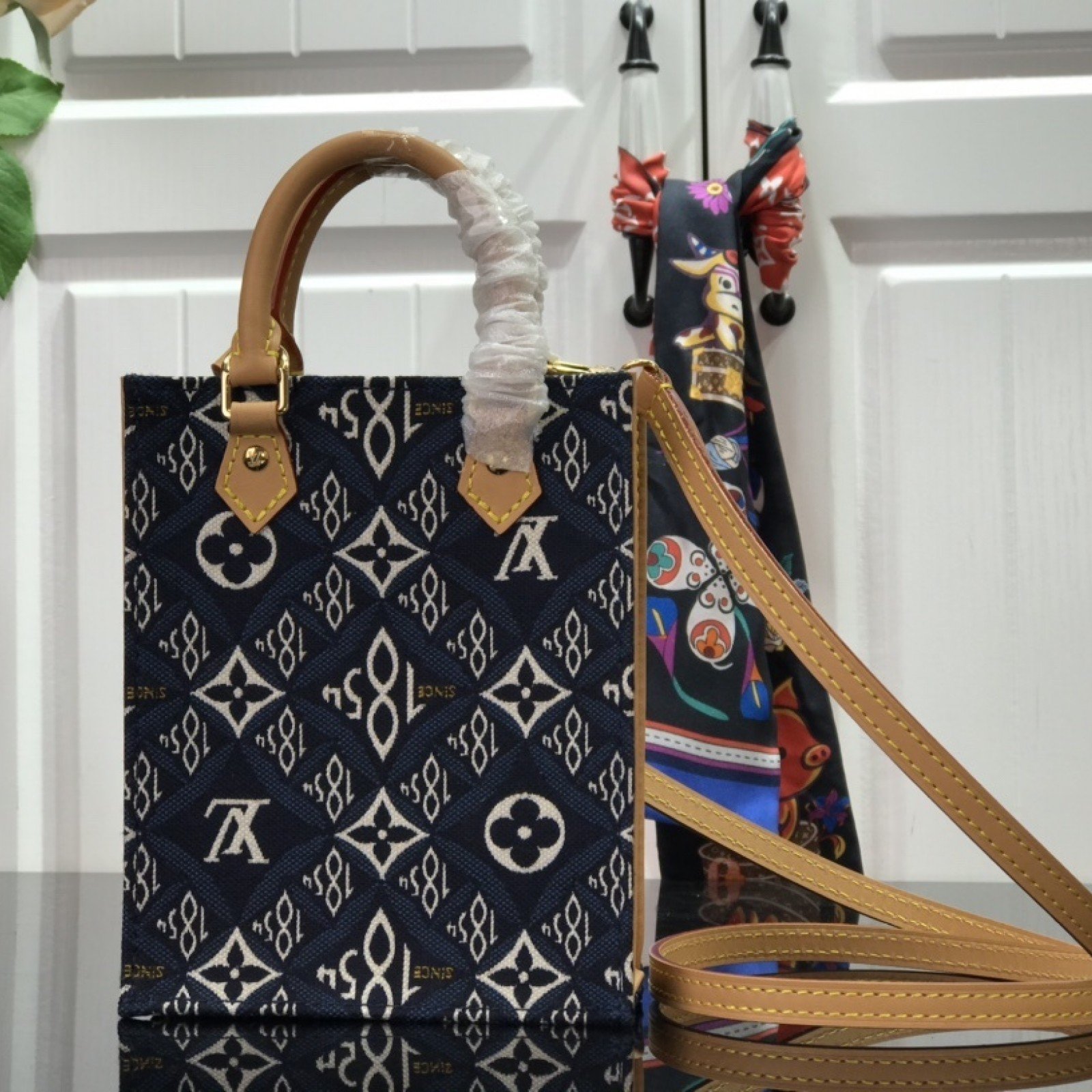 LV SINCE 1854 PETIT SAC PLAT M80288