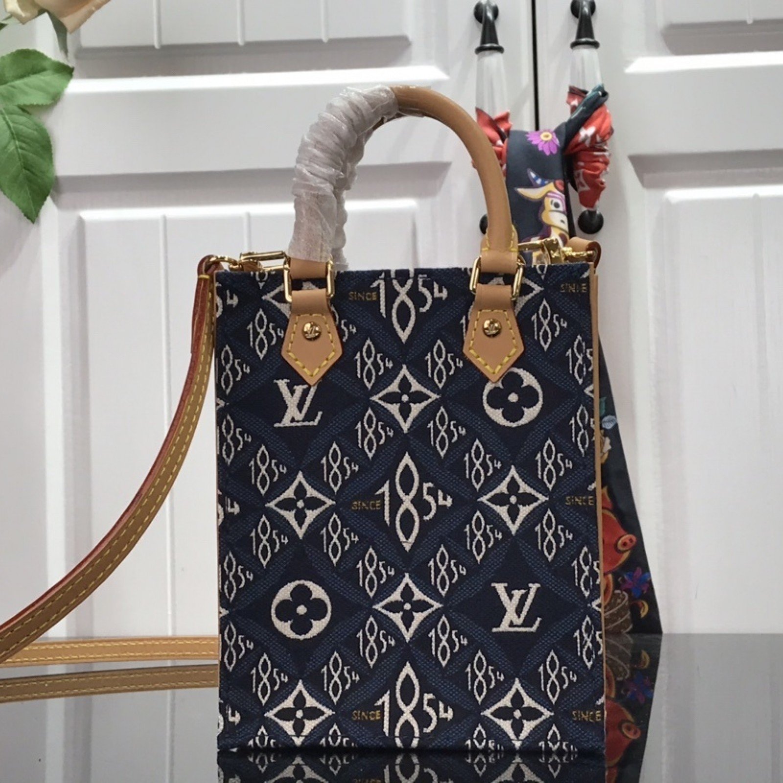 LV SINCE 1854 PETIT SAC PLAT M80288