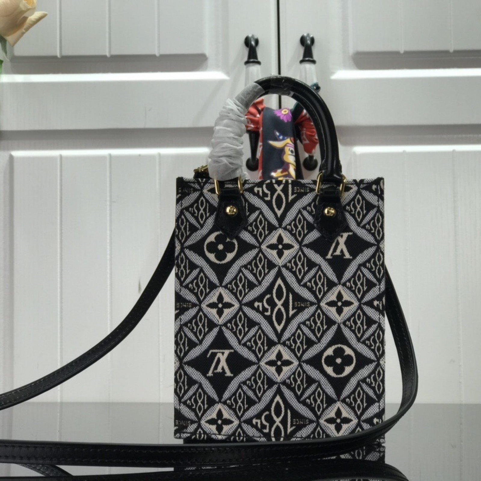LV SINCE 1854 PETIT SAC PLAT M80288