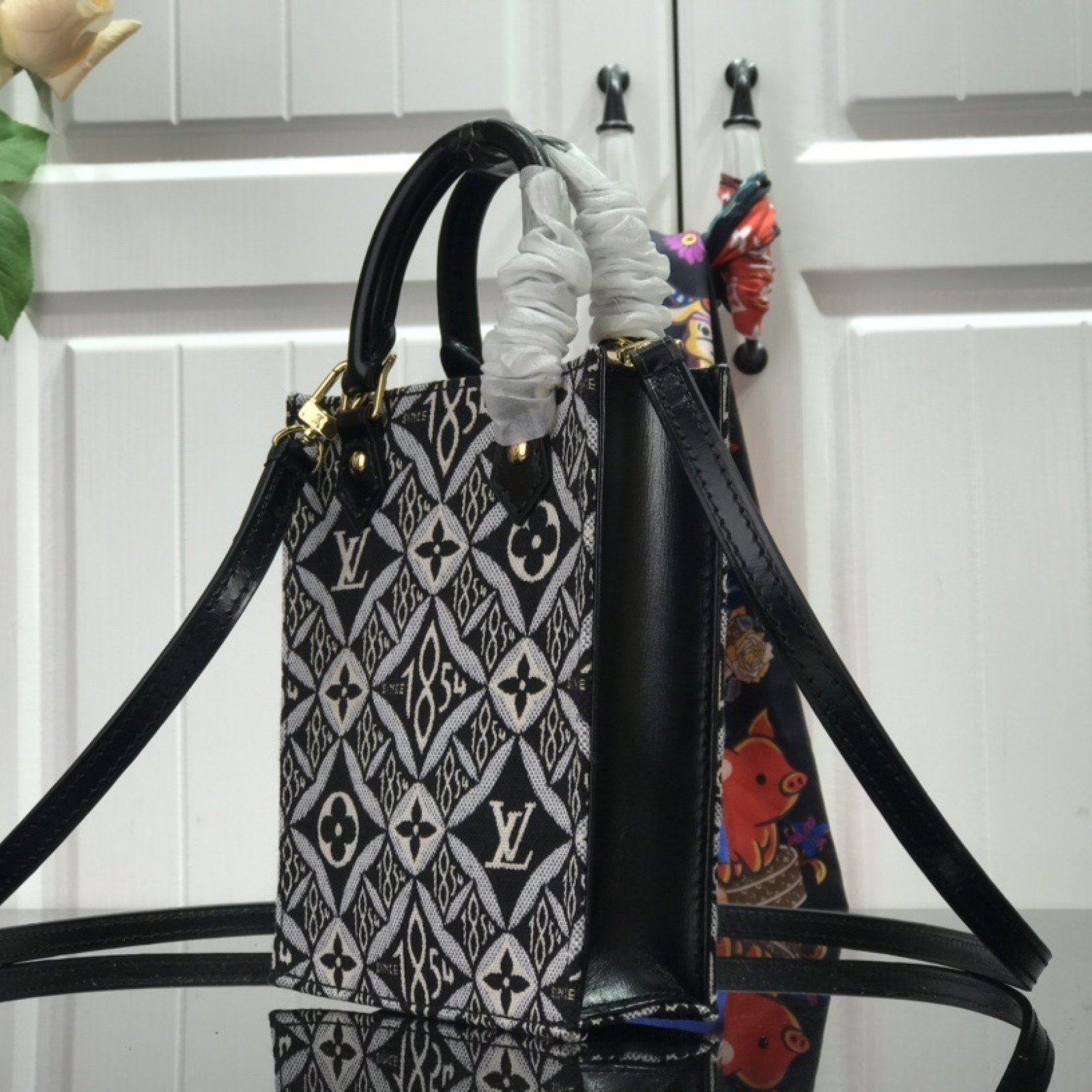 LV SINCE 1854 PETIT SAC PLAT M80288