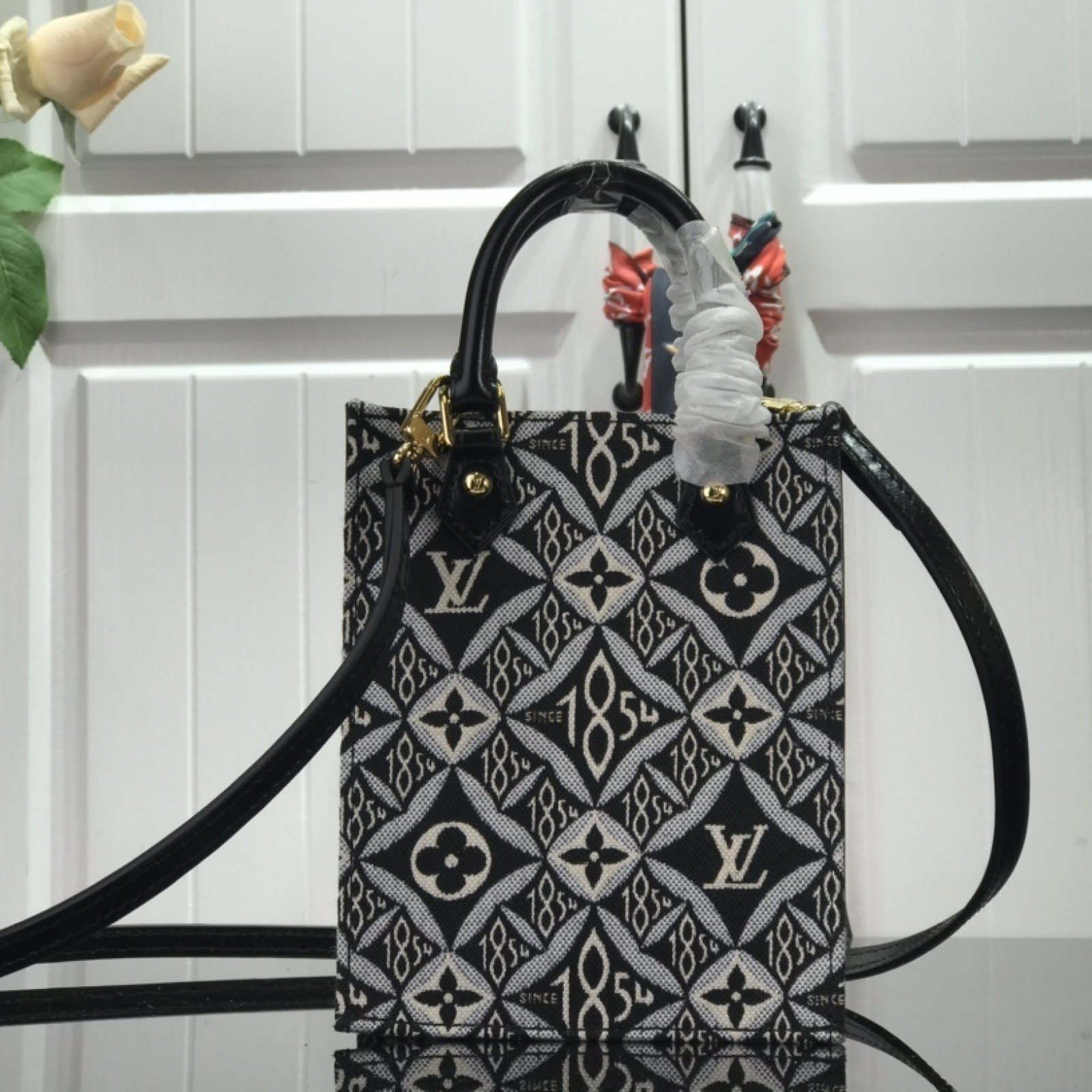 LV SINCE 1854 PETIT SAC PLAT M80288