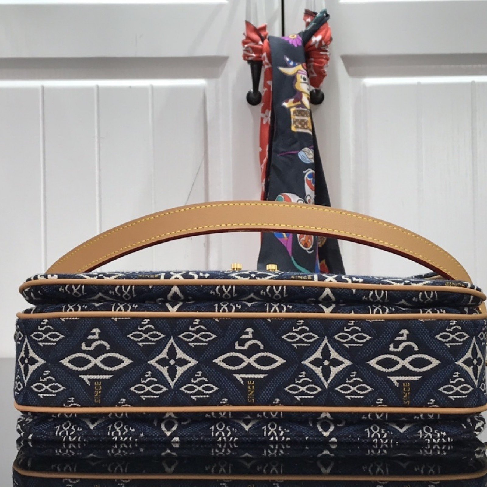 LV SINCE 1854 POCHETTE METIS M57395
