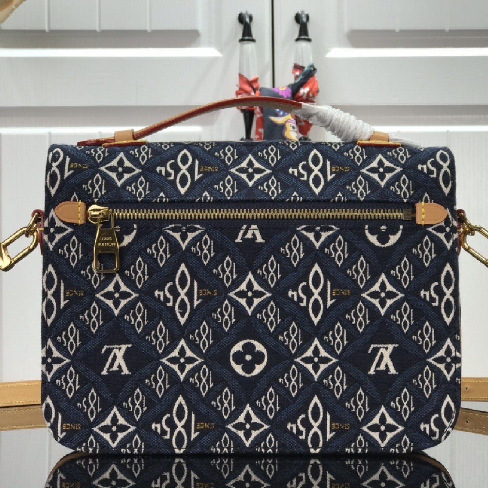 LV SINCE 1854 POCHETTE METIS M57395
