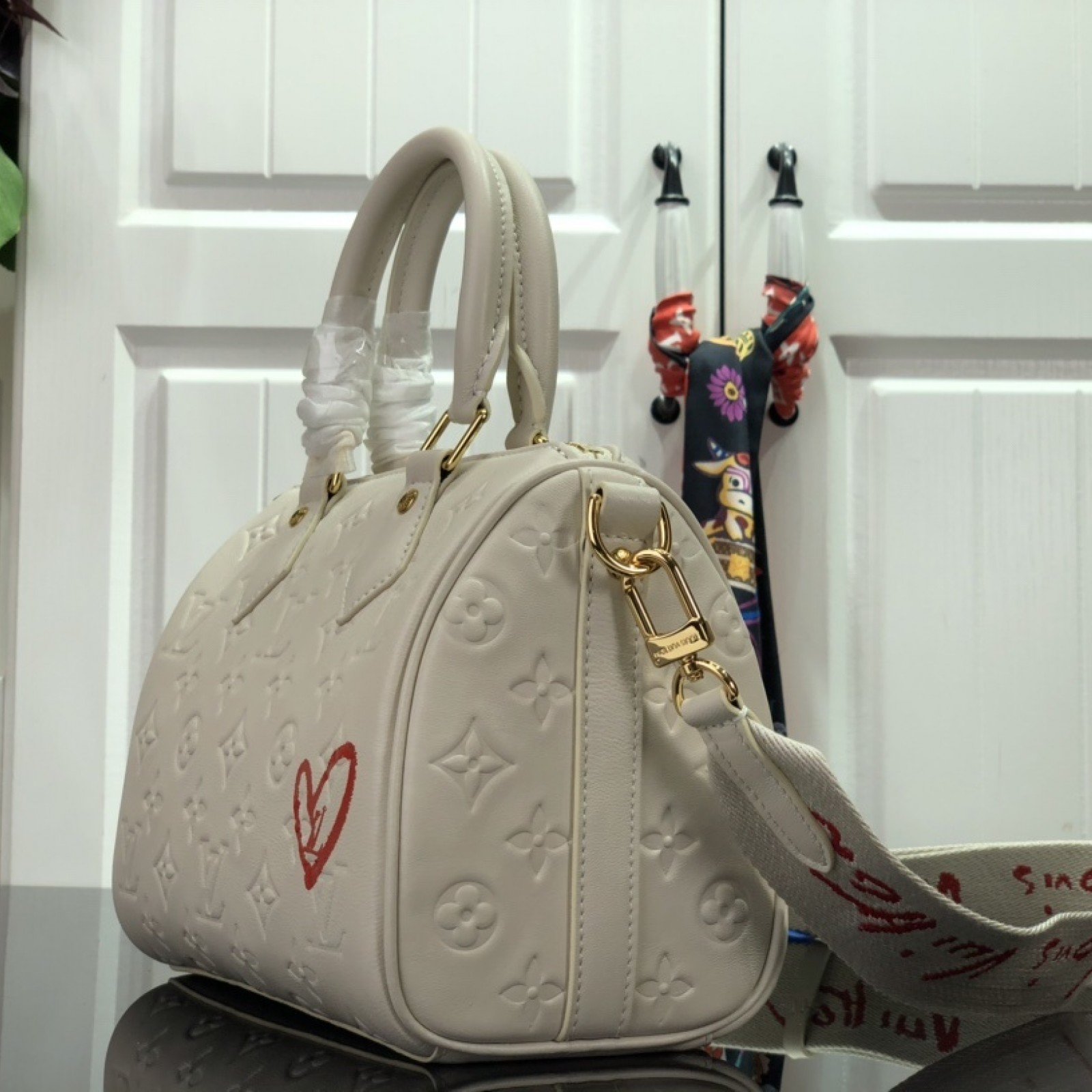 LV SPEEDY BANDOULIERE 22 M58736