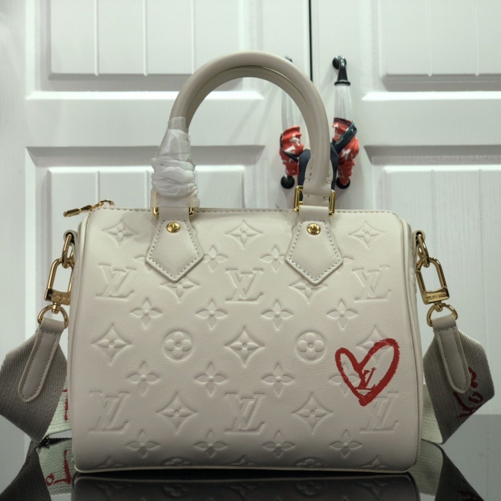 LV SPEEDY BANDOULIERE 22 M58736
