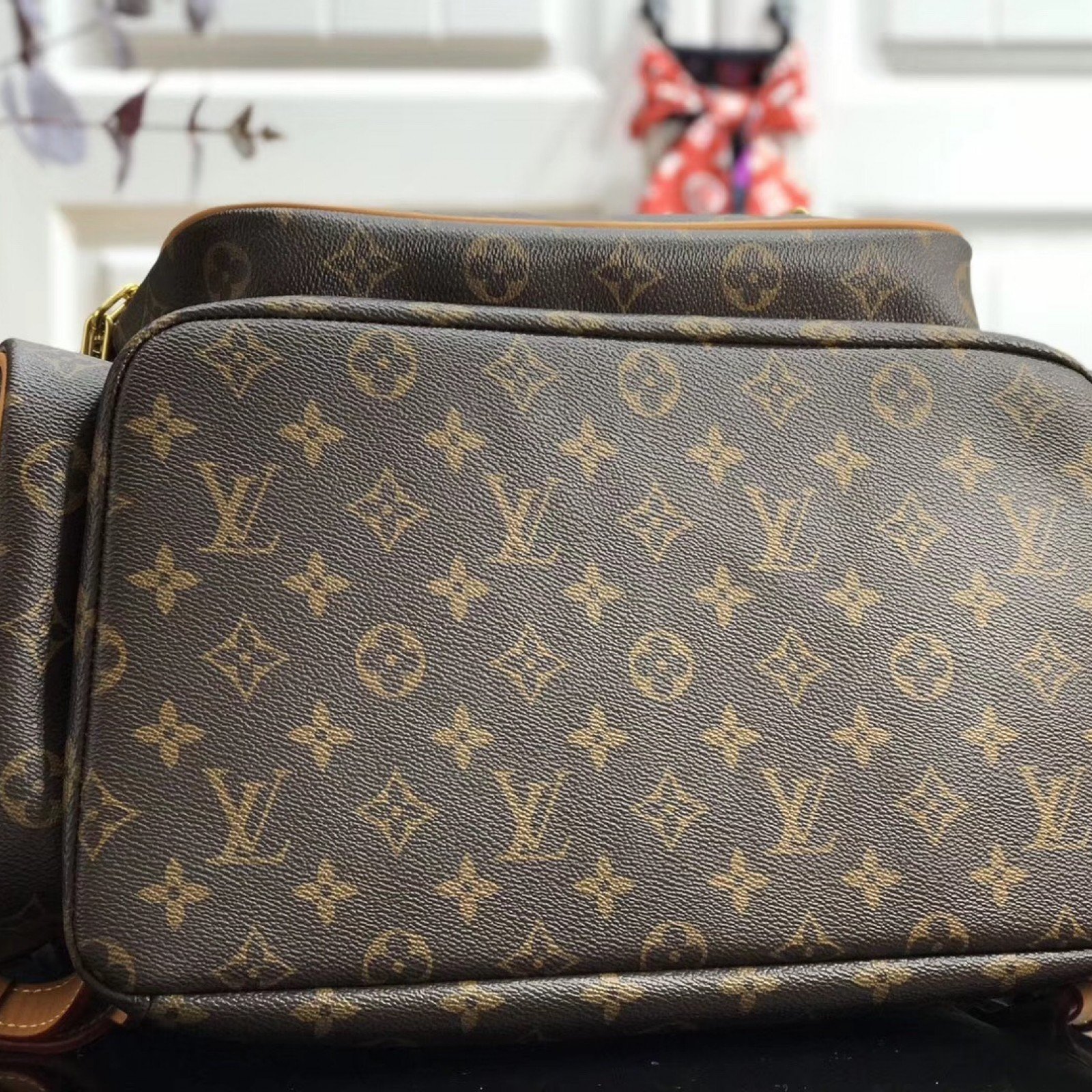 LV TRIO BACKPACK M44658