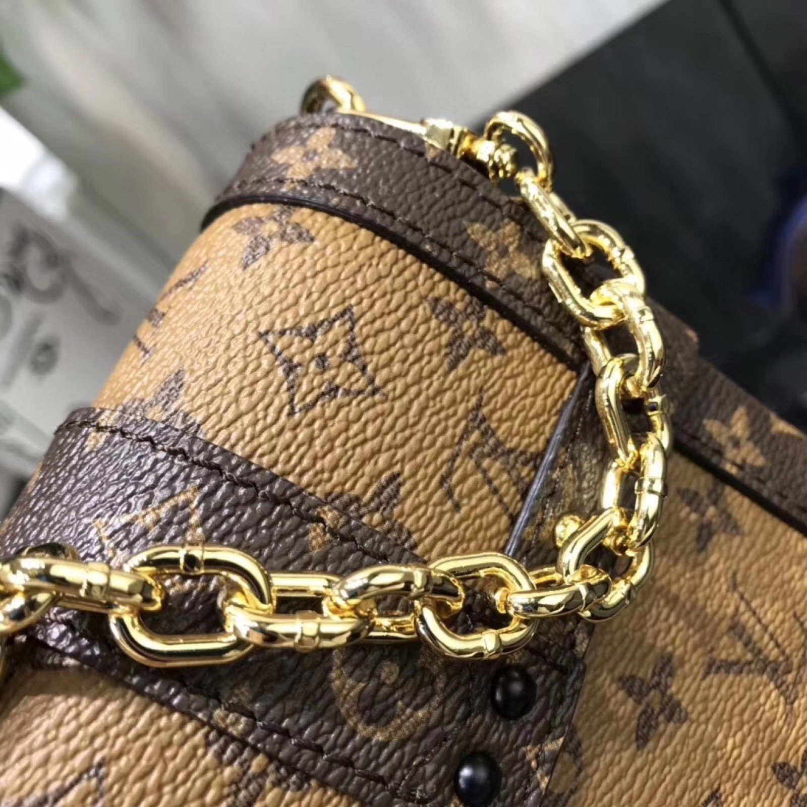LV VERTICAL TRUNK POCHETTE M63913